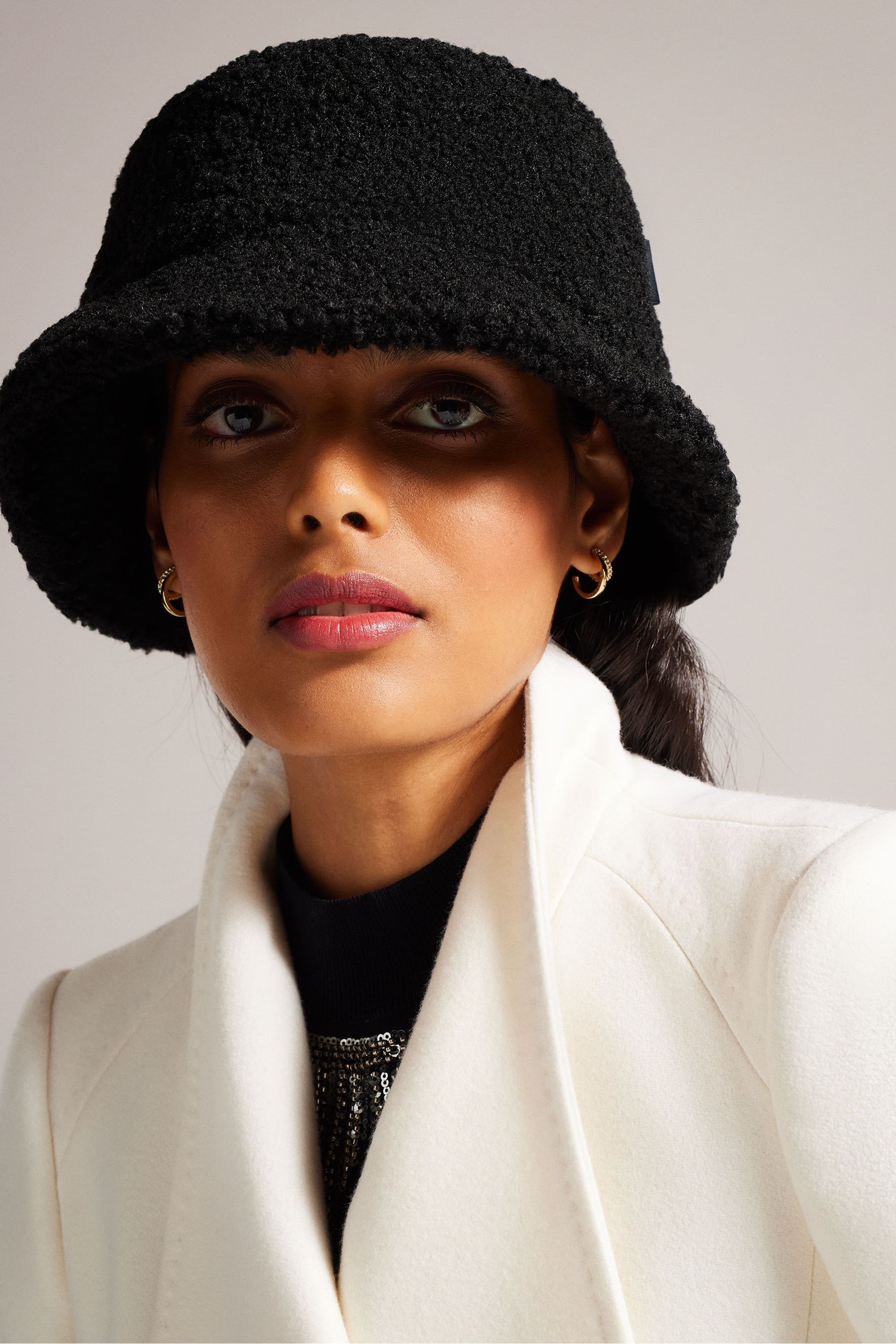 Buy Ted Baker Pamells Black Faux Shearling Bucket Hat from the