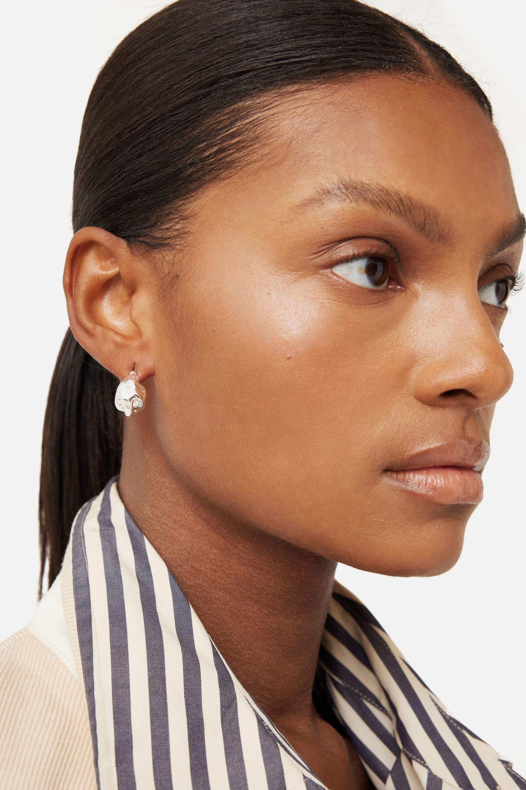 Buy Jigsaw Silver Tone Molten Metal Hoop Earrings from the Next UK