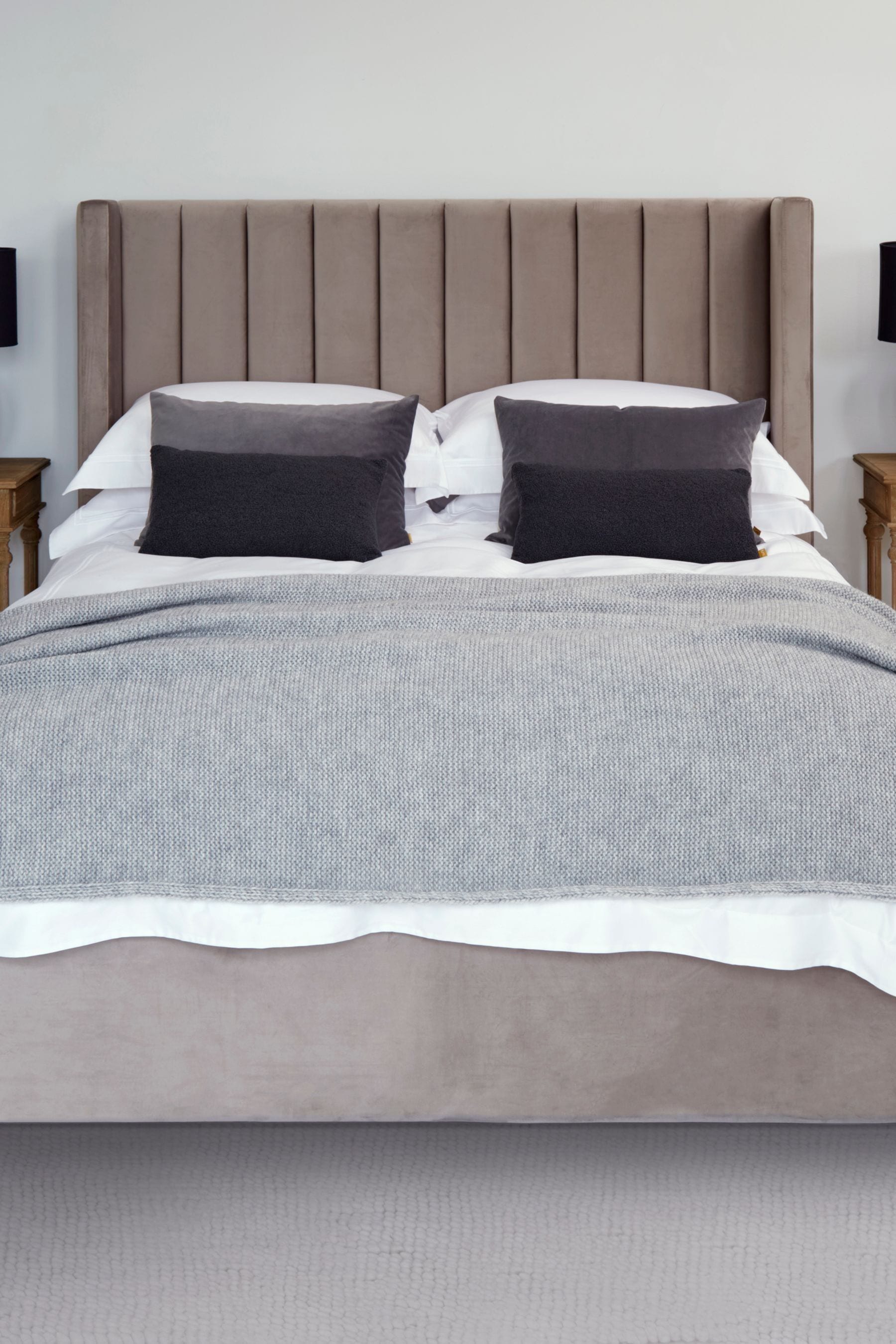 Feather and store black ottoman bed