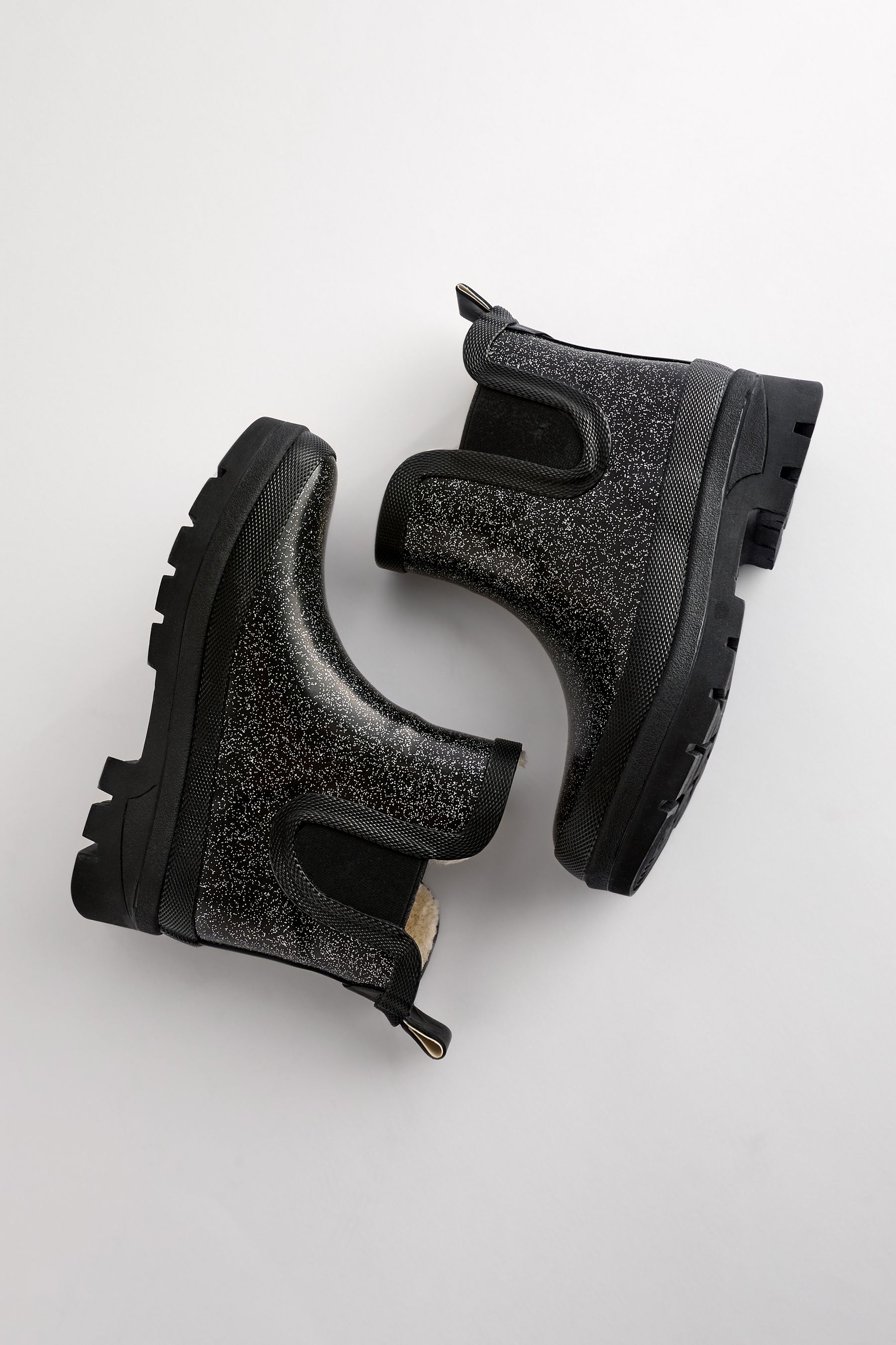 Black glitter chelsea boots top