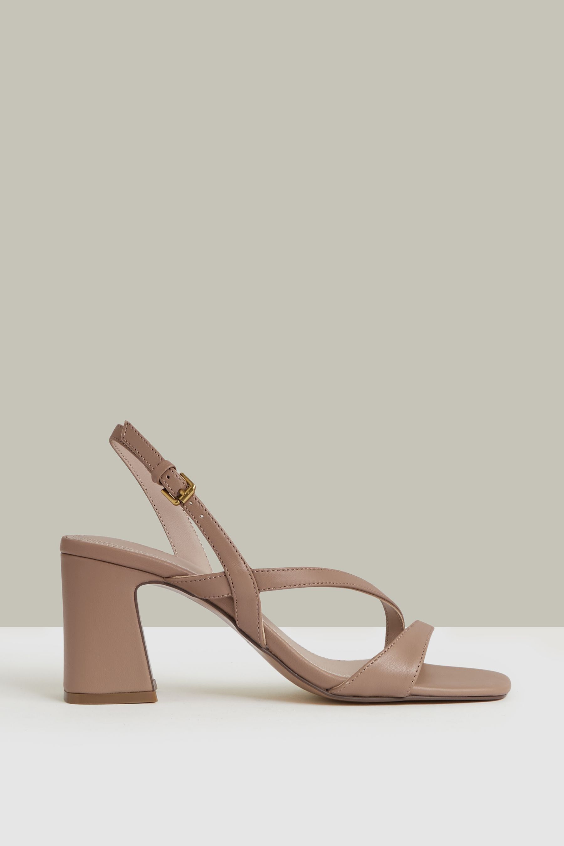 Strappy leather heeled sandals on sale