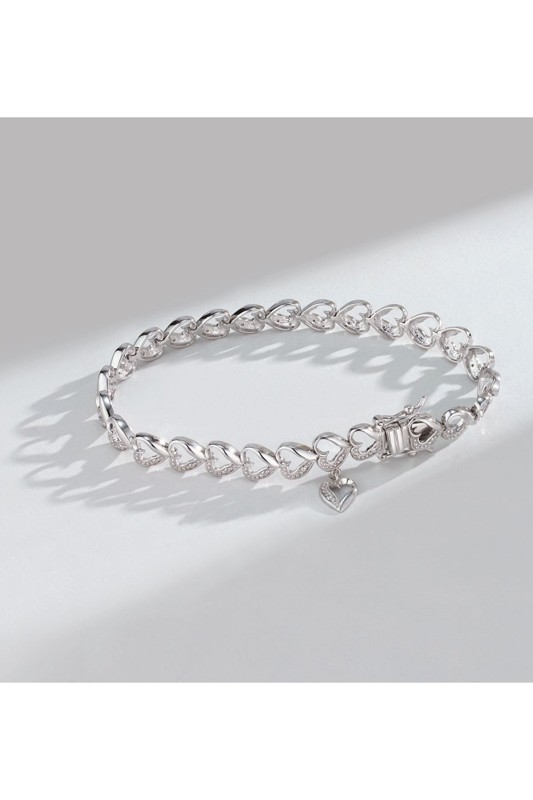 Sterling silver on sale diamond heart bracelet