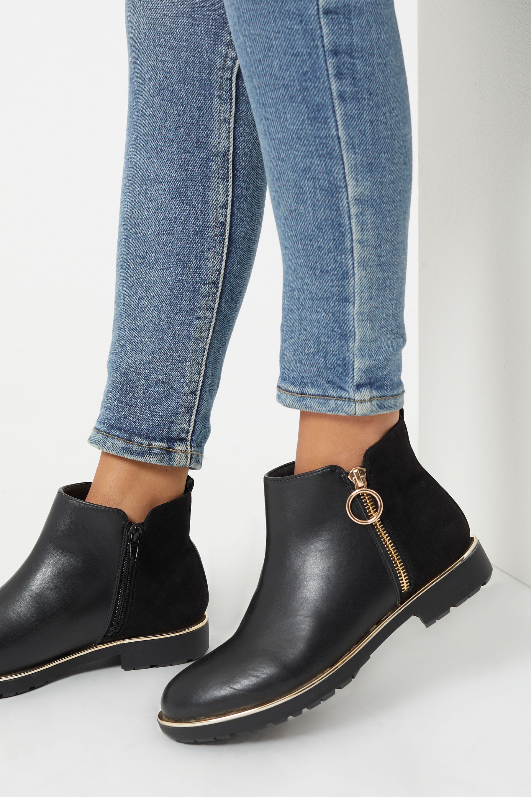 Flat black leather store ankle boots