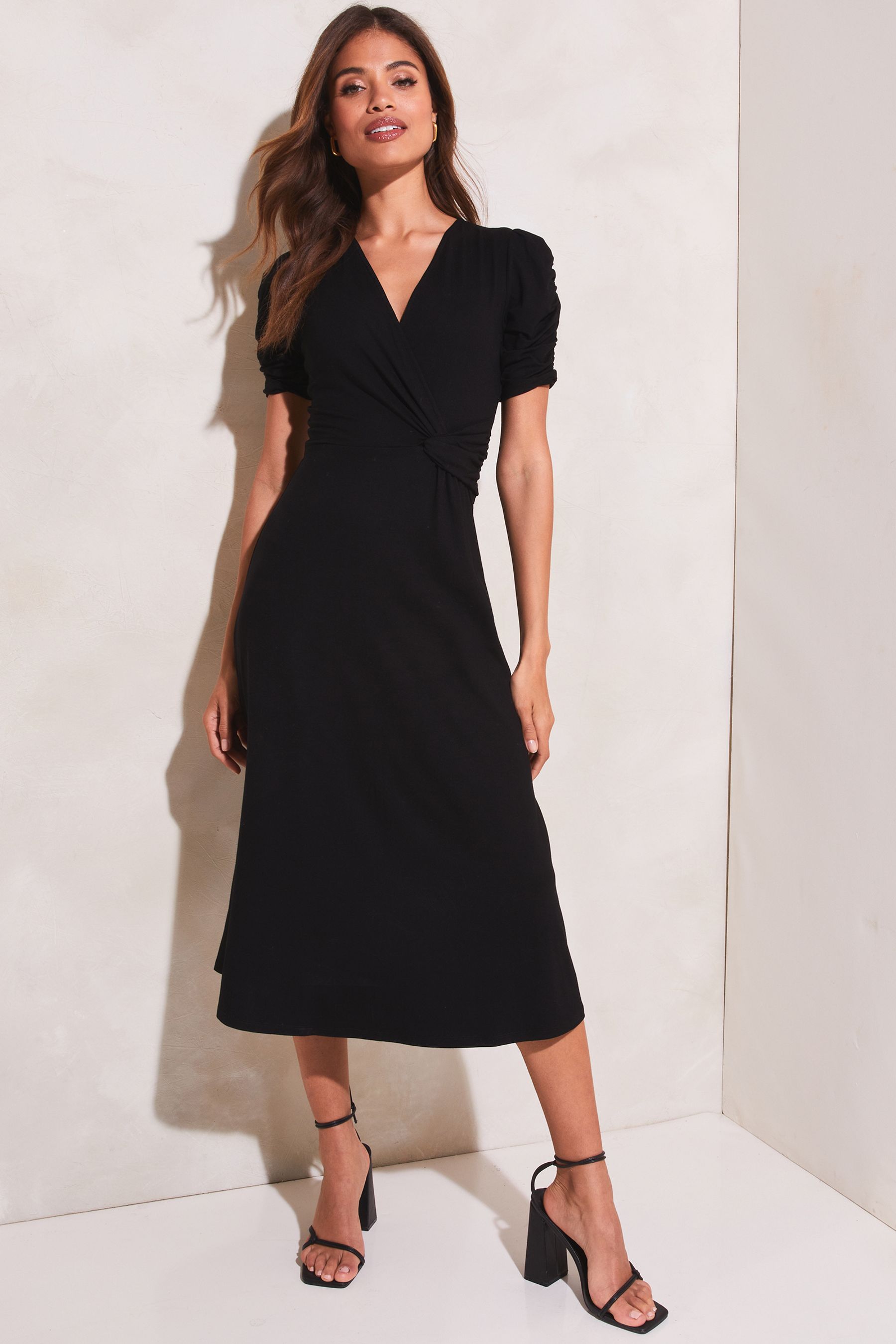 Black jersey midi dress with sleeves top