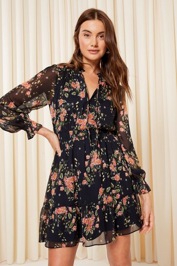 Friends Like These Navy Blue Floral Petite Chiffon Tie Neck Ruffle Hem Mini Dress