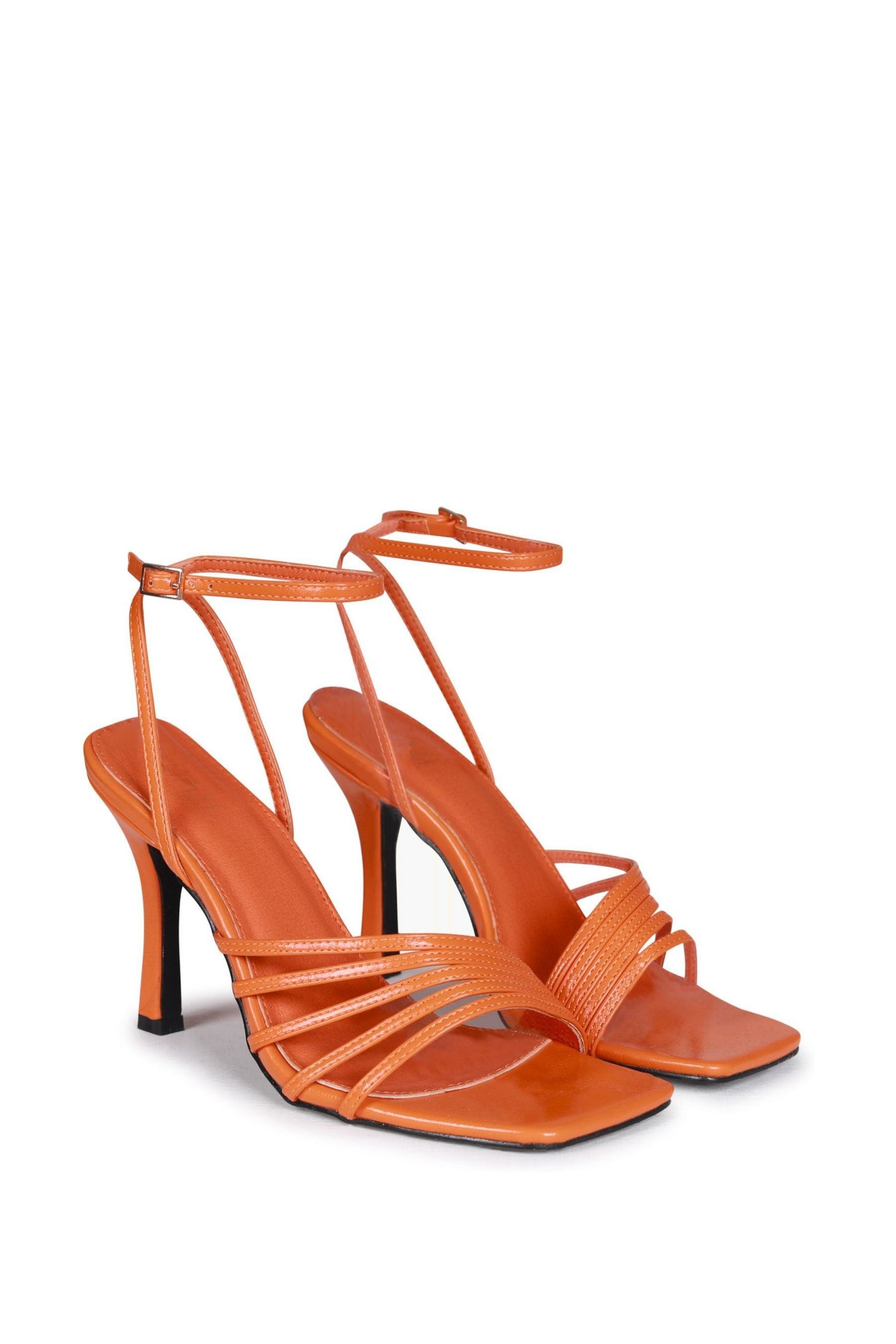 Orange best sale sandals next