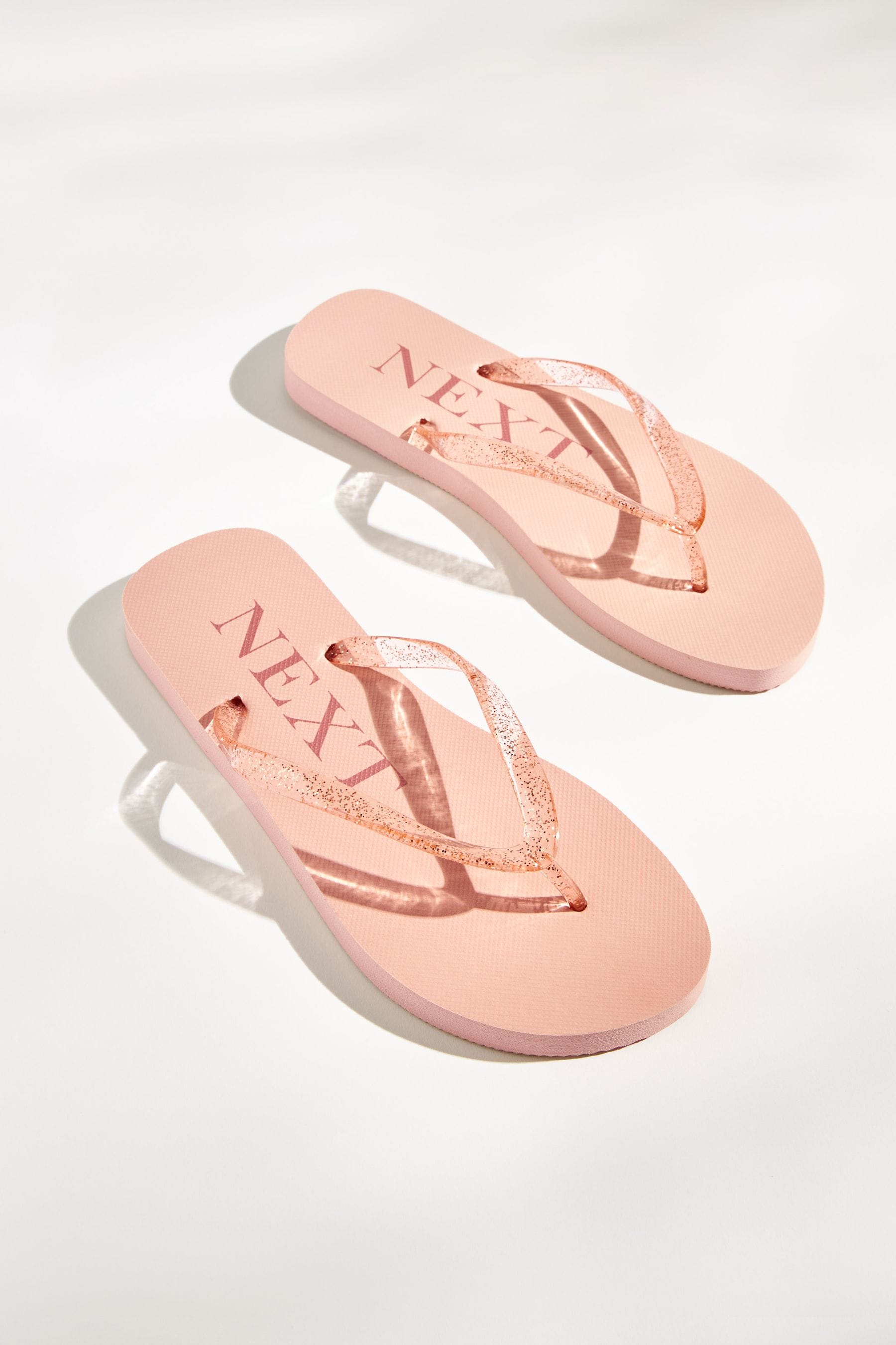Blush shop flip flops