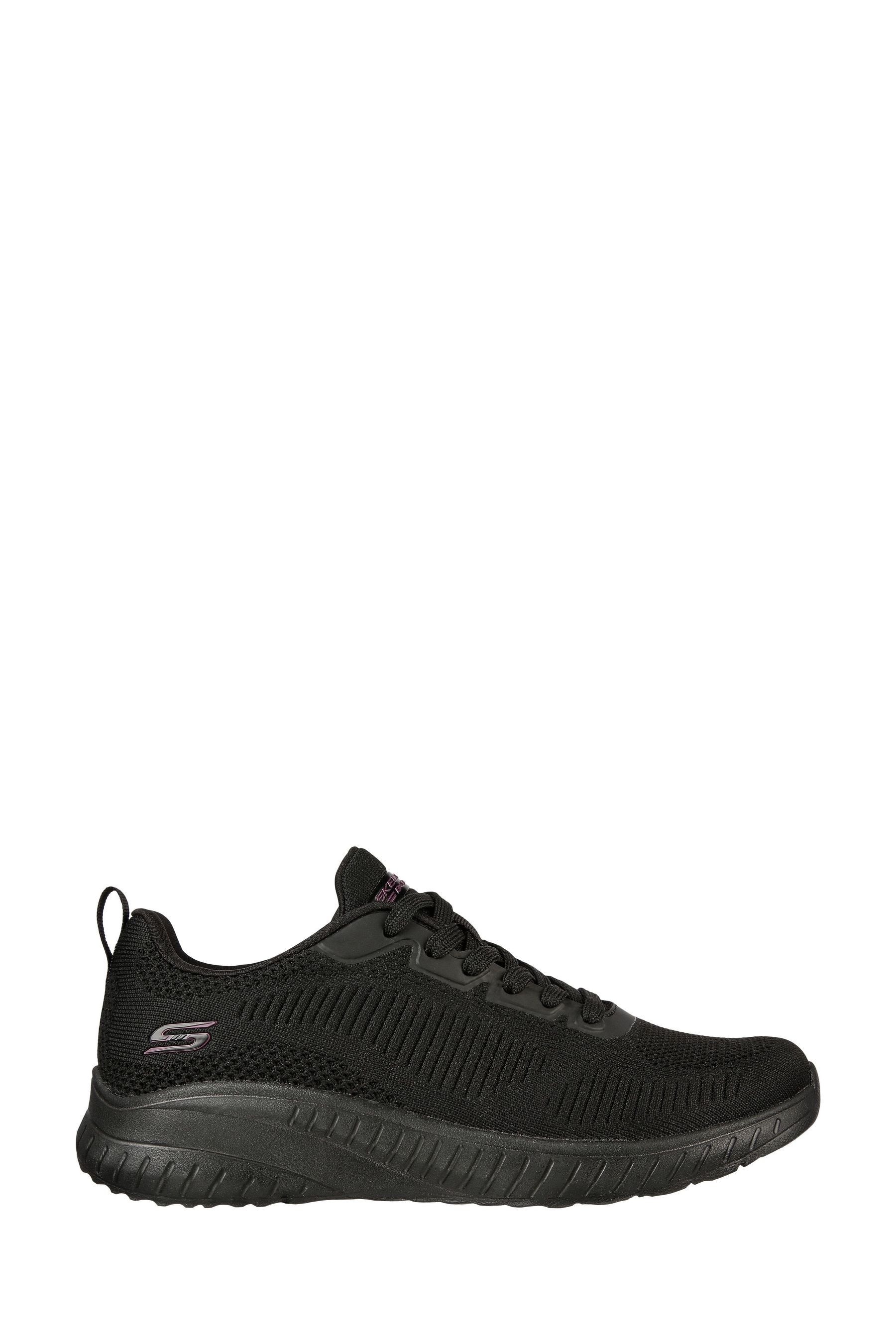 Skechers trainers sales black and white