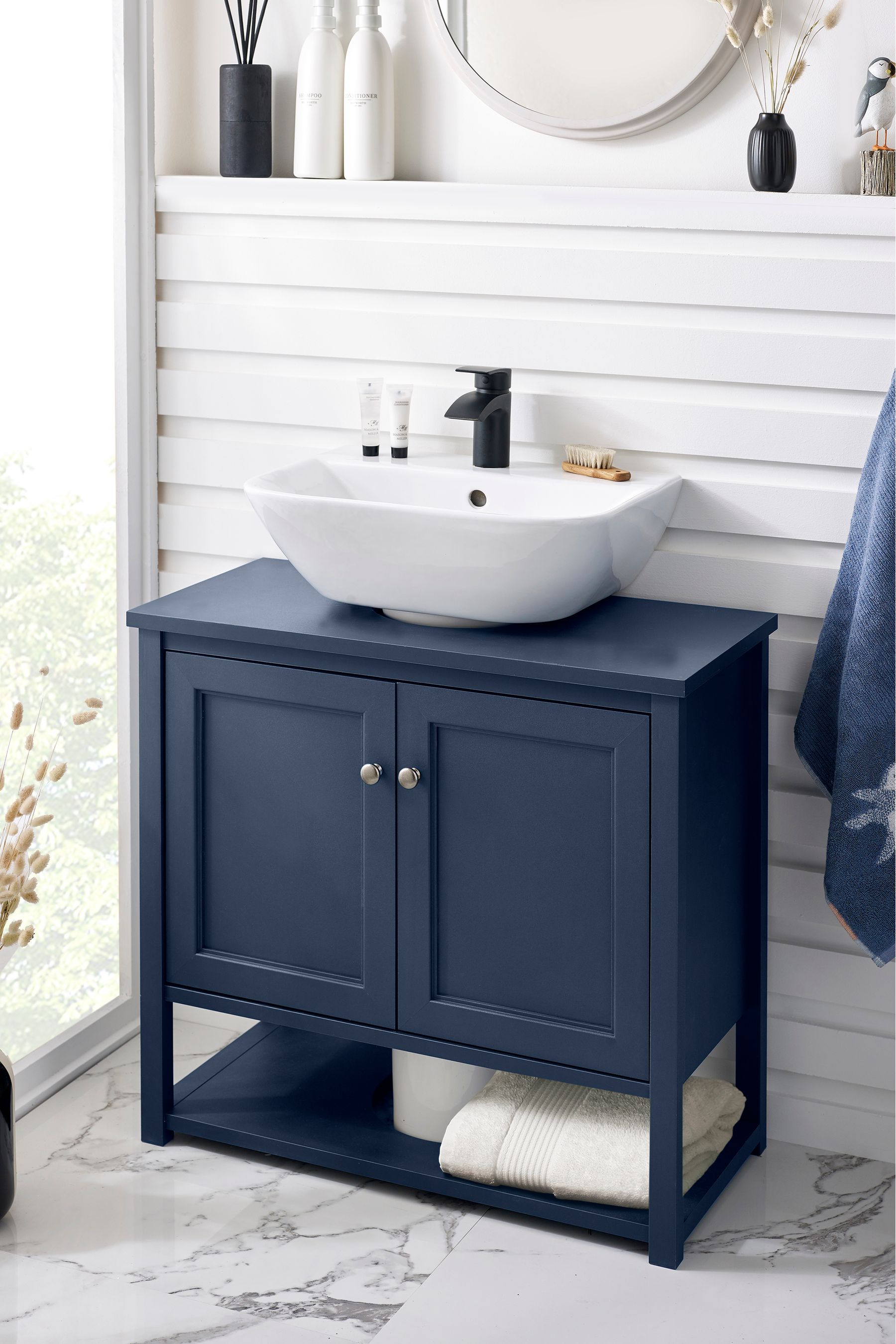 Sink storage clearance unit