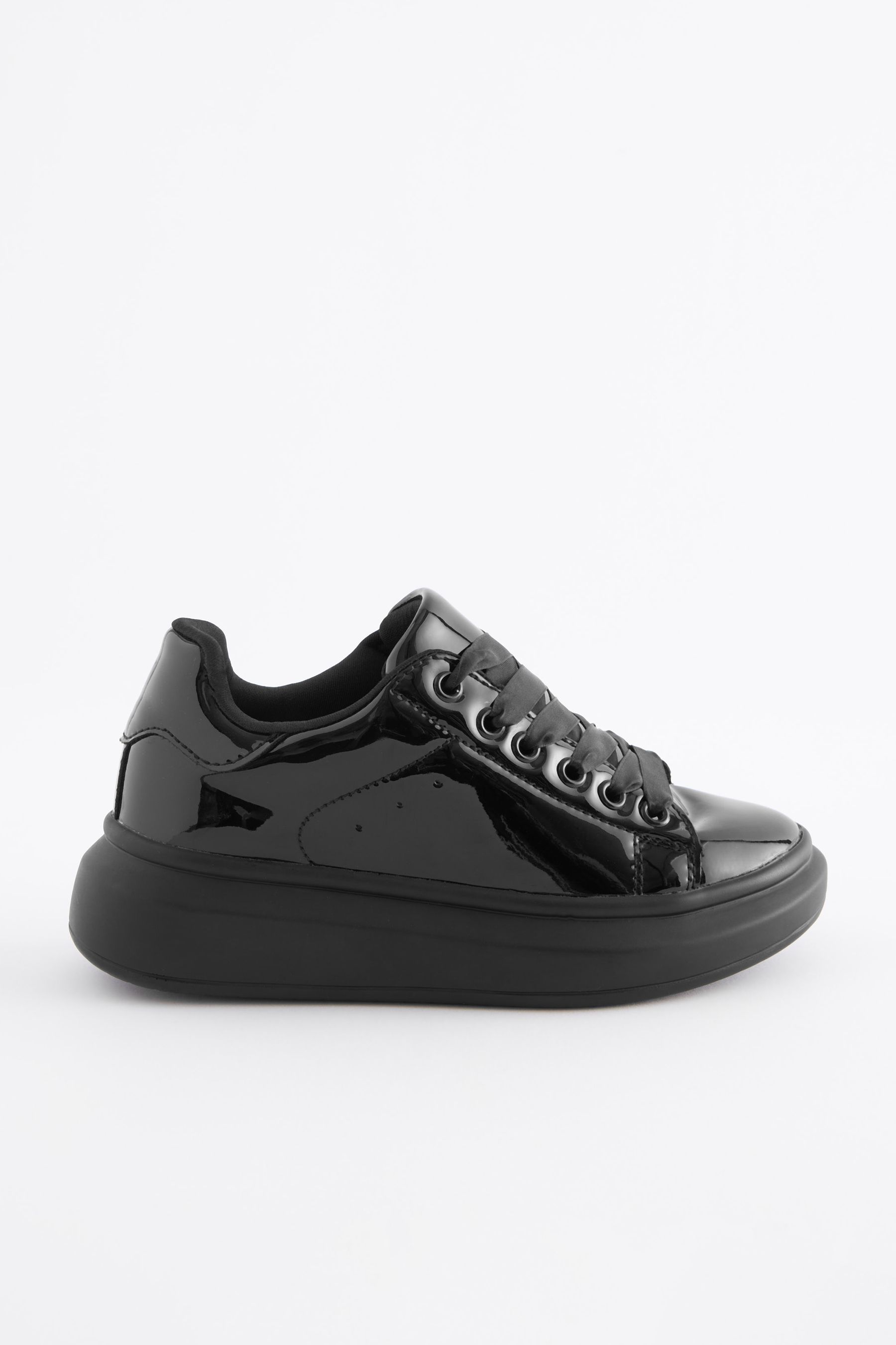 Black trainers shop with ribbon laces