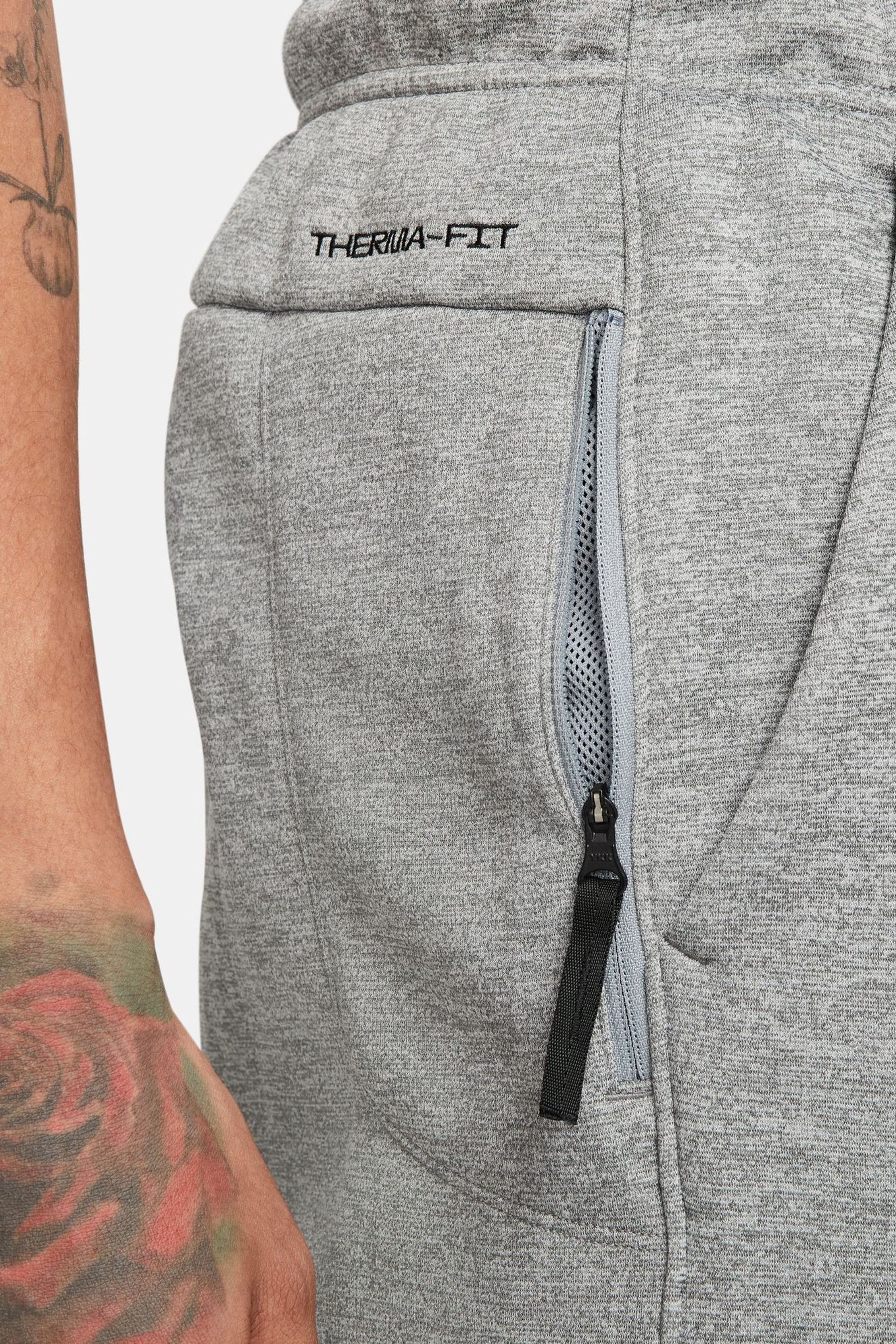 Nike thermal sweatpants deals