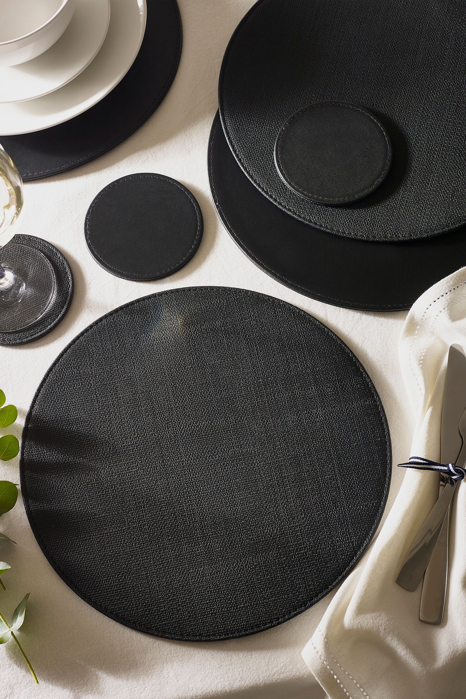 Buy Set of 4 Black Reversible Faux Leather Placemats and Coasters Set from the Next UK online shop