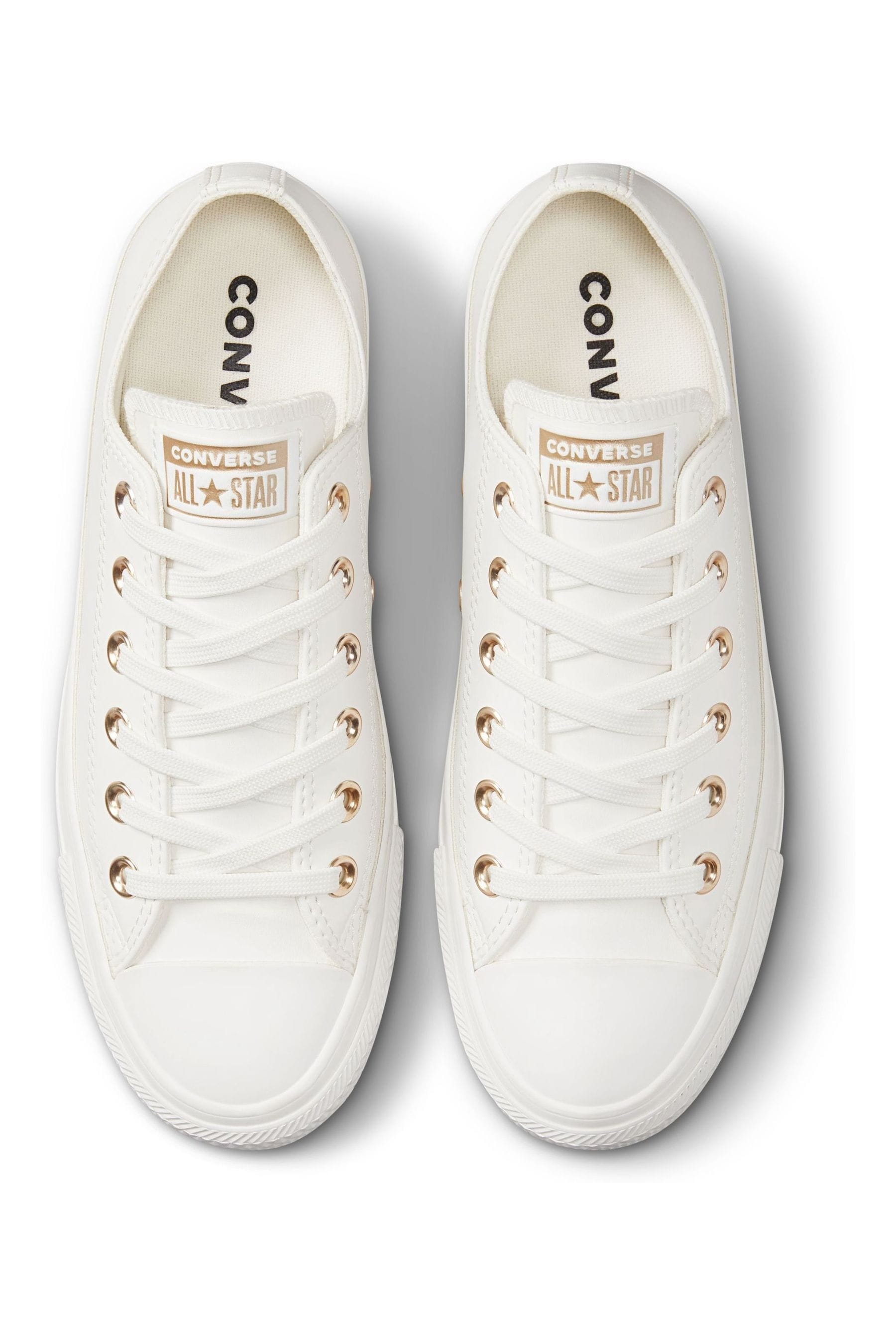 Converse white and gold leather store