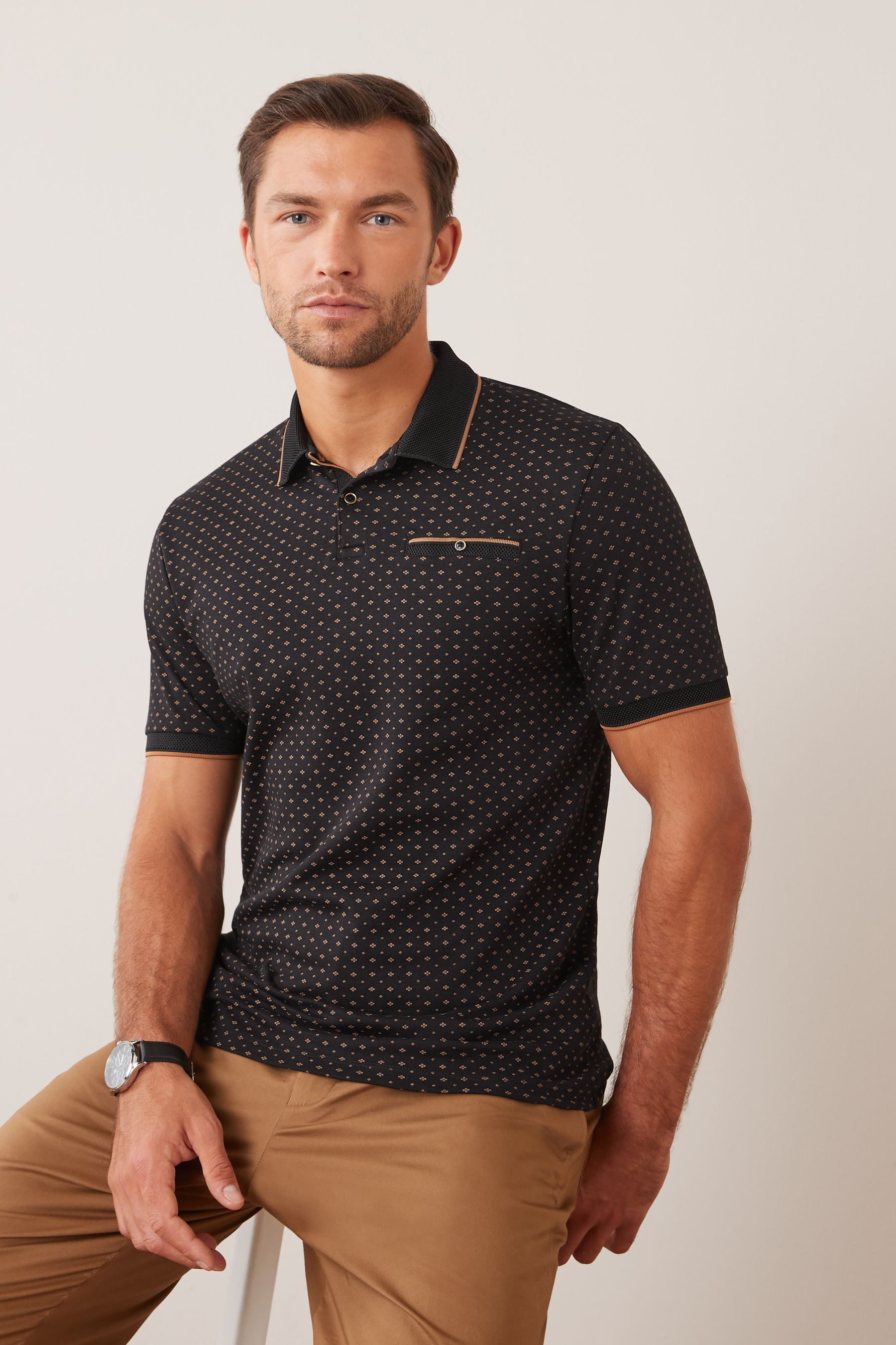 Mens black and shop gold polo shirt