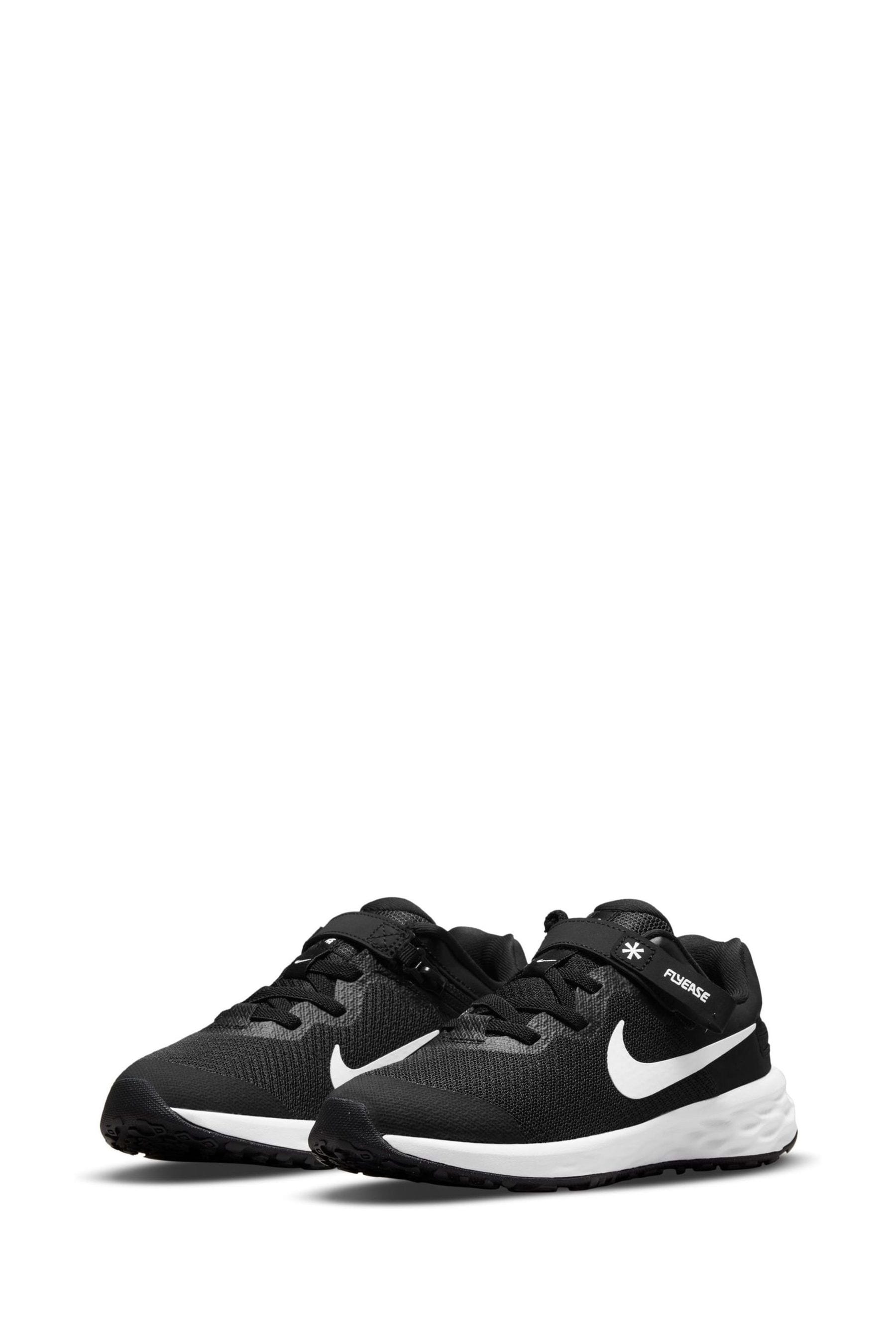 Nike revolution junior trainers hotsell