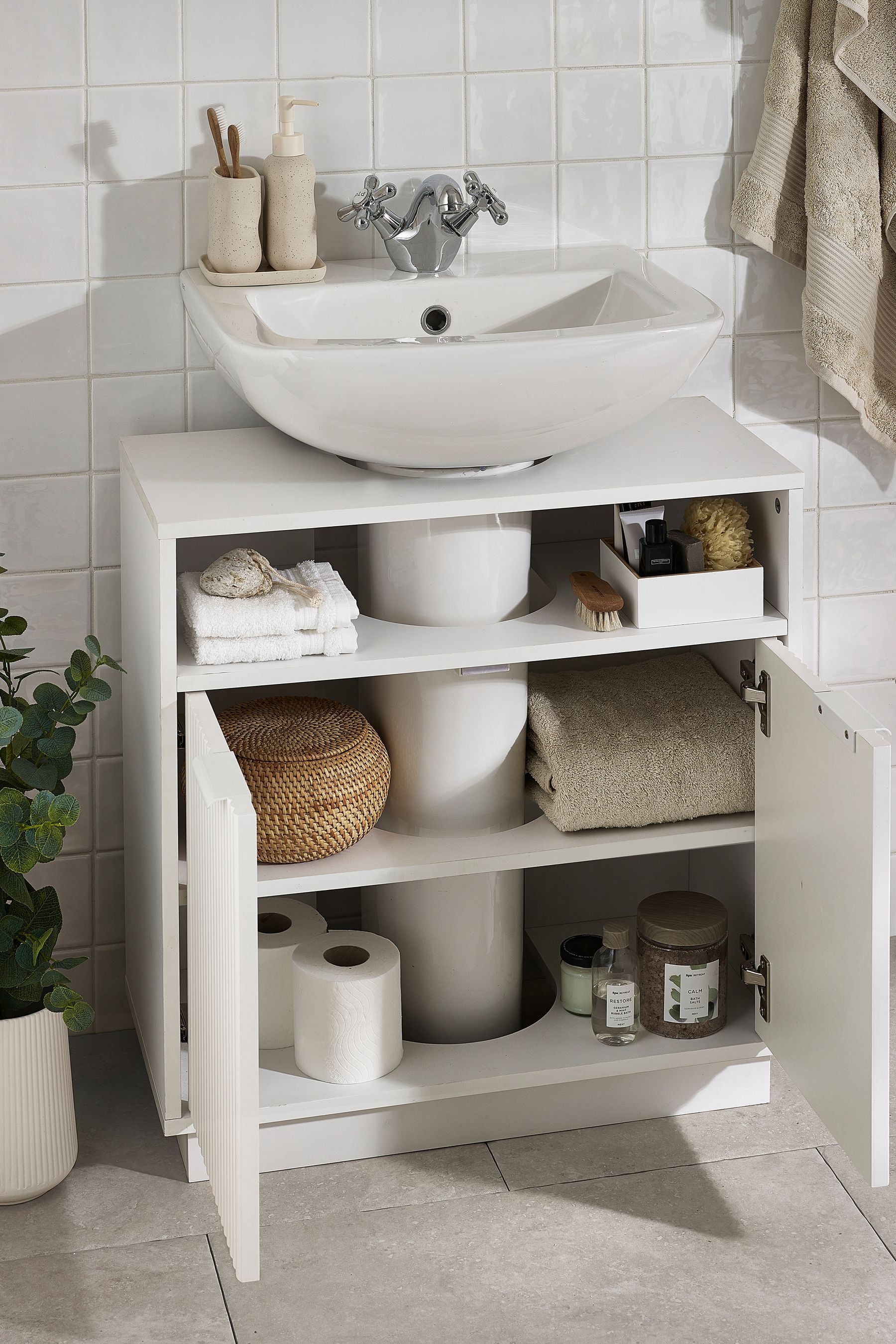 White under shop sink cabinet