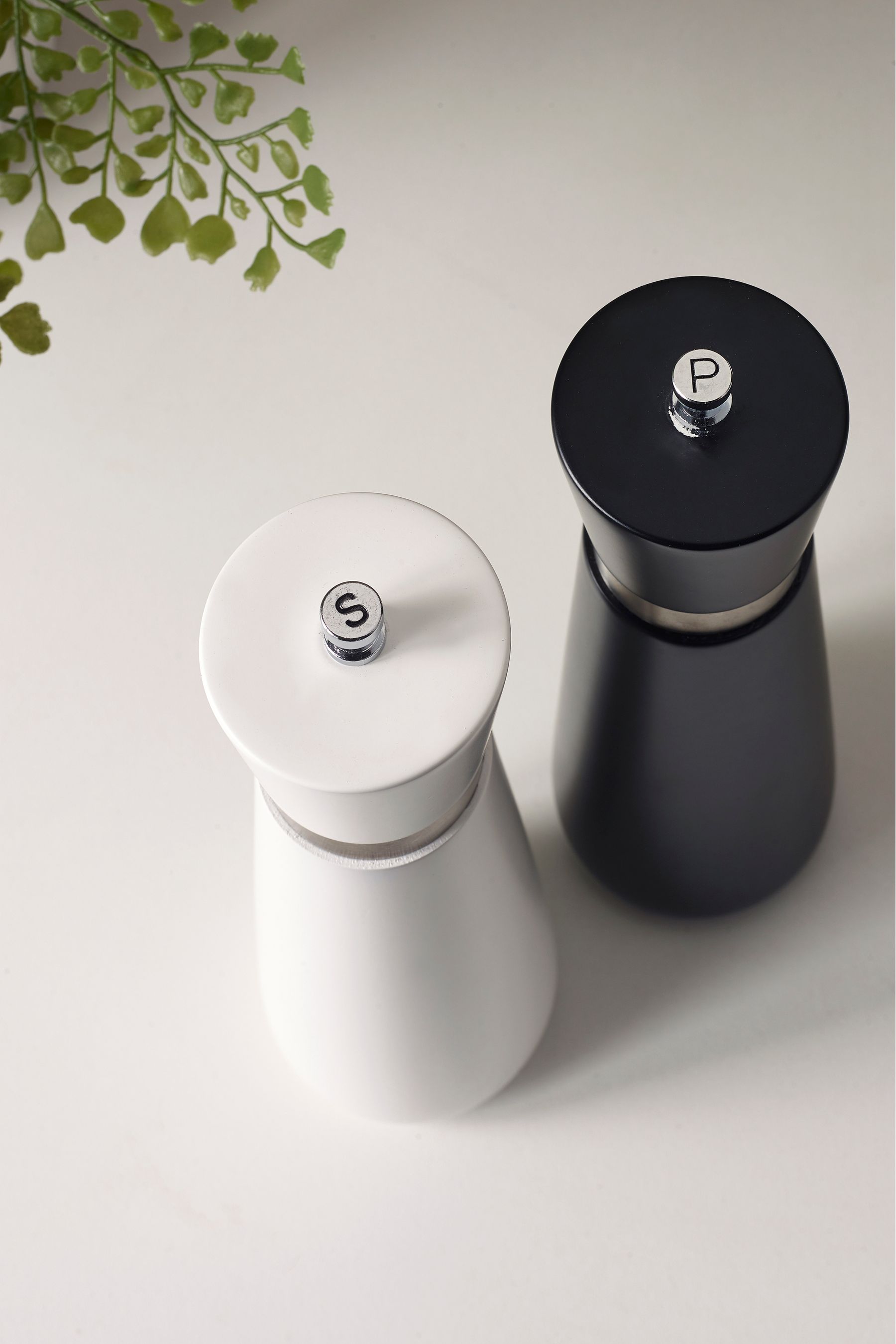Buy Black White Filled Salt And Pepper Grinders from the Next UK