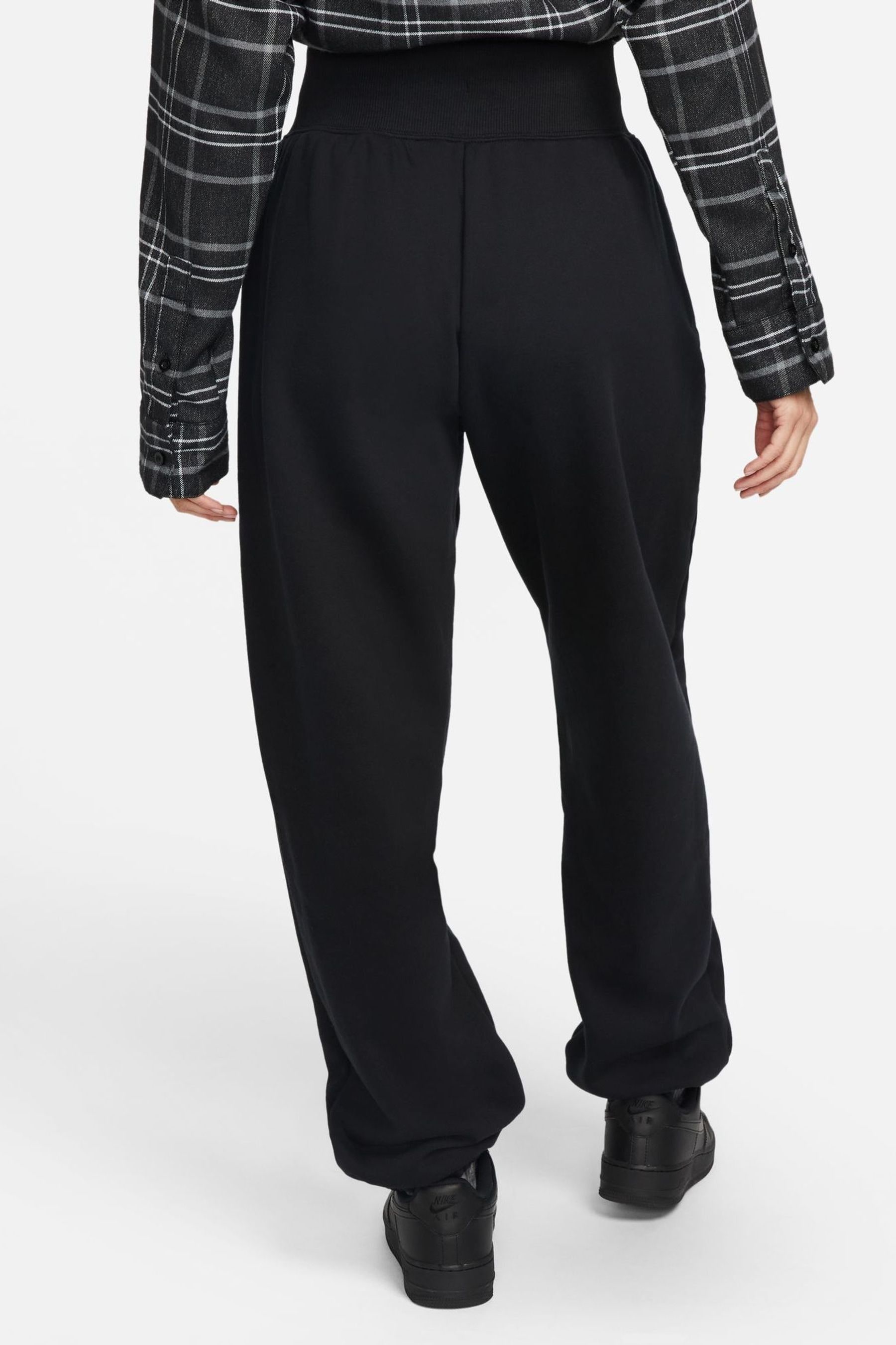 Nike mini swoosh high waisted wide leg joggers in black outlet