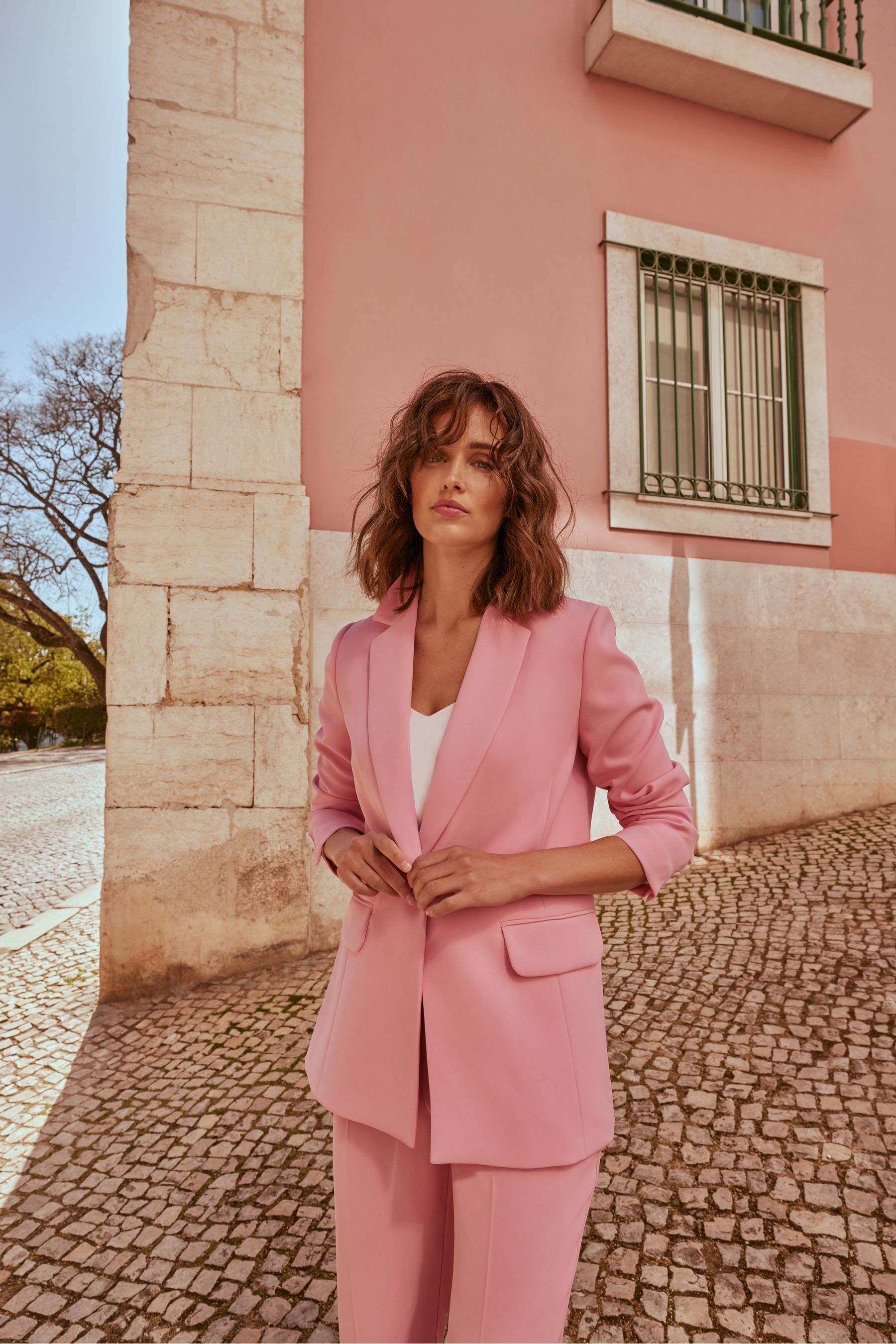 Pink trouser suit deals next