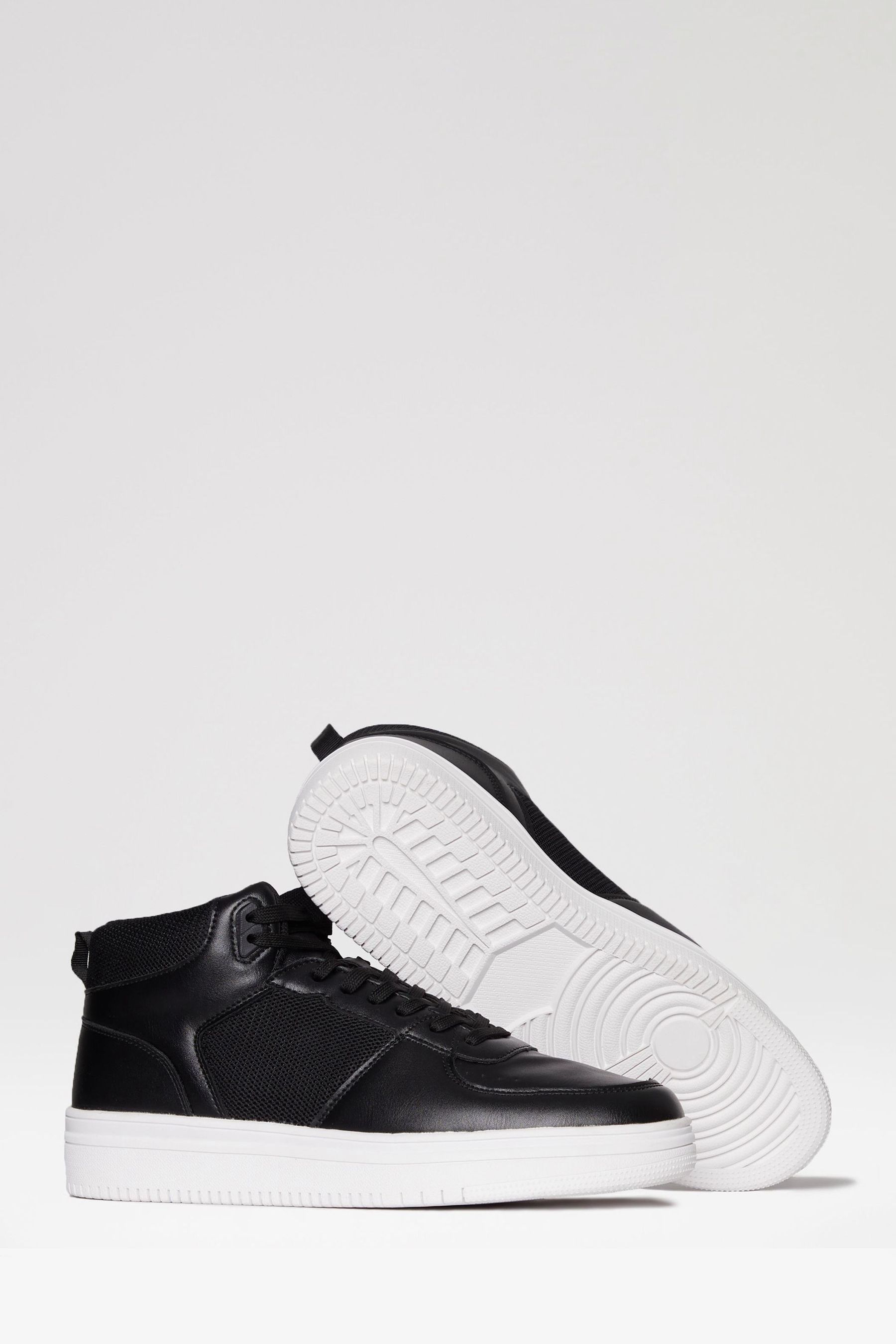 Black high tops white sole store