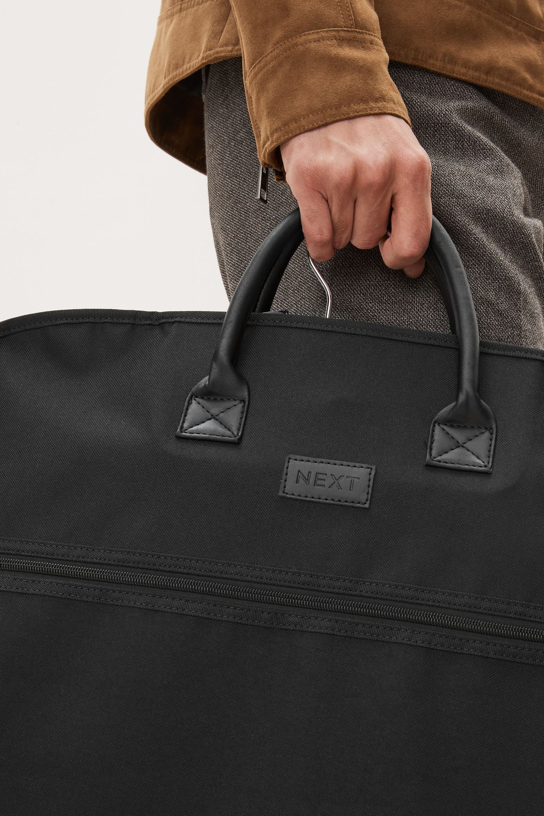 Suit store carrier next