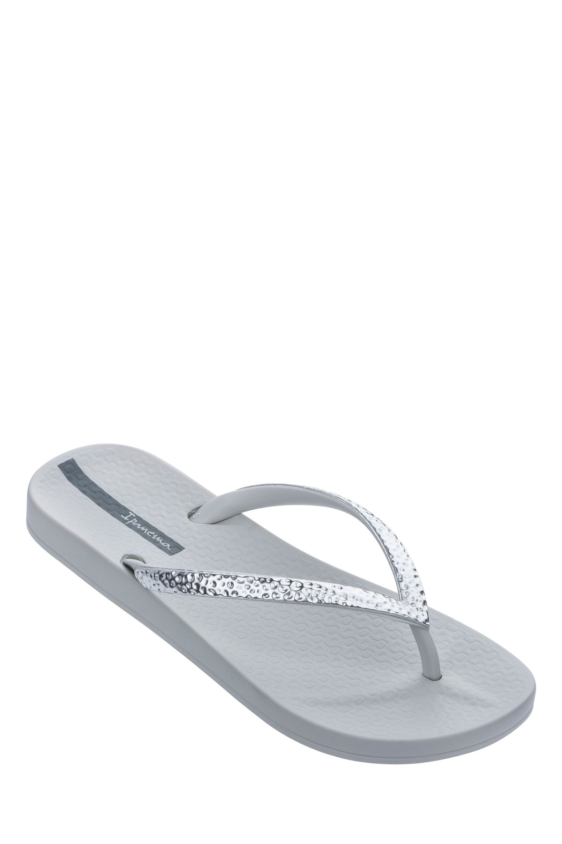 Metallic silver best sale flip flops