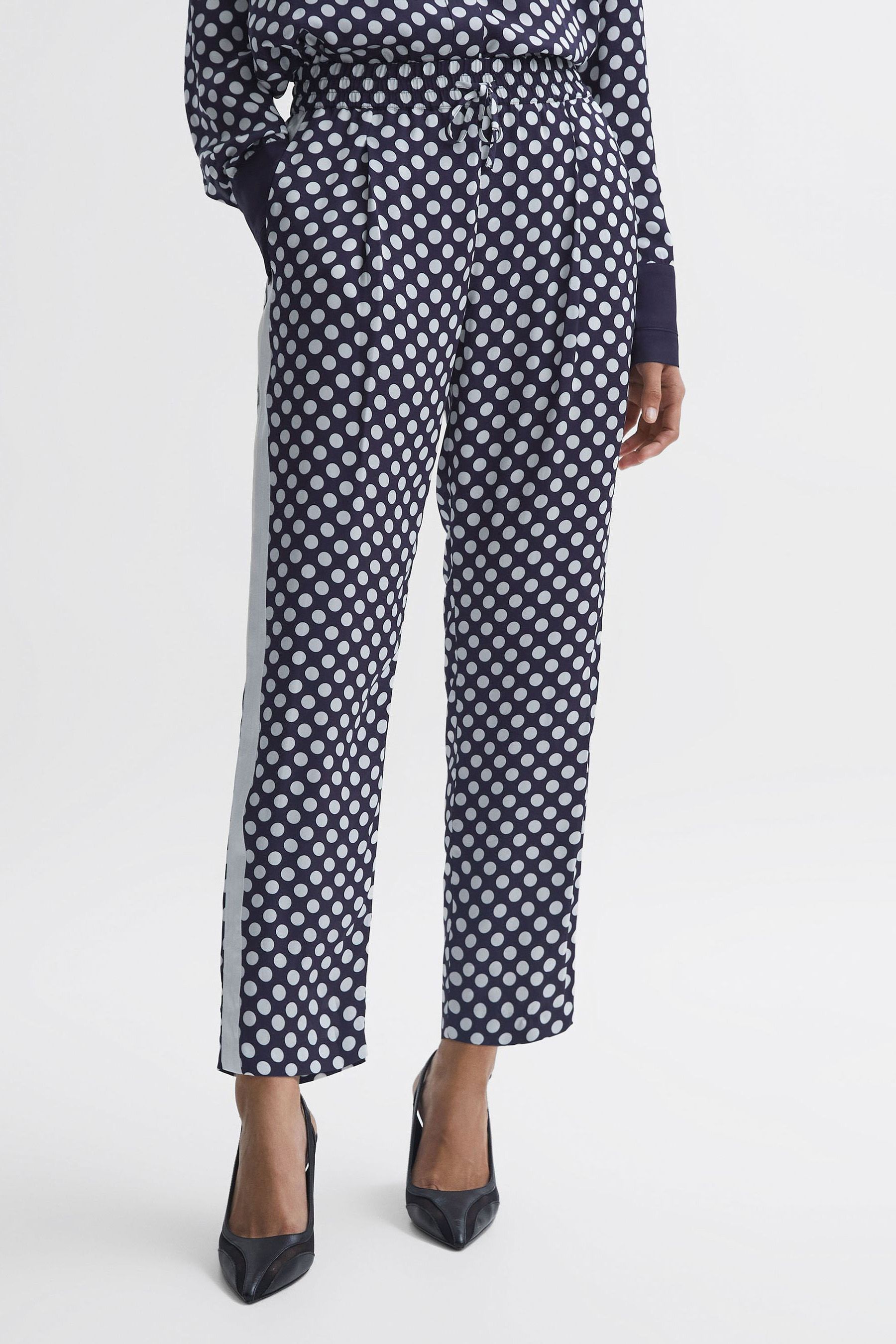 Black and white polka dot pants sales