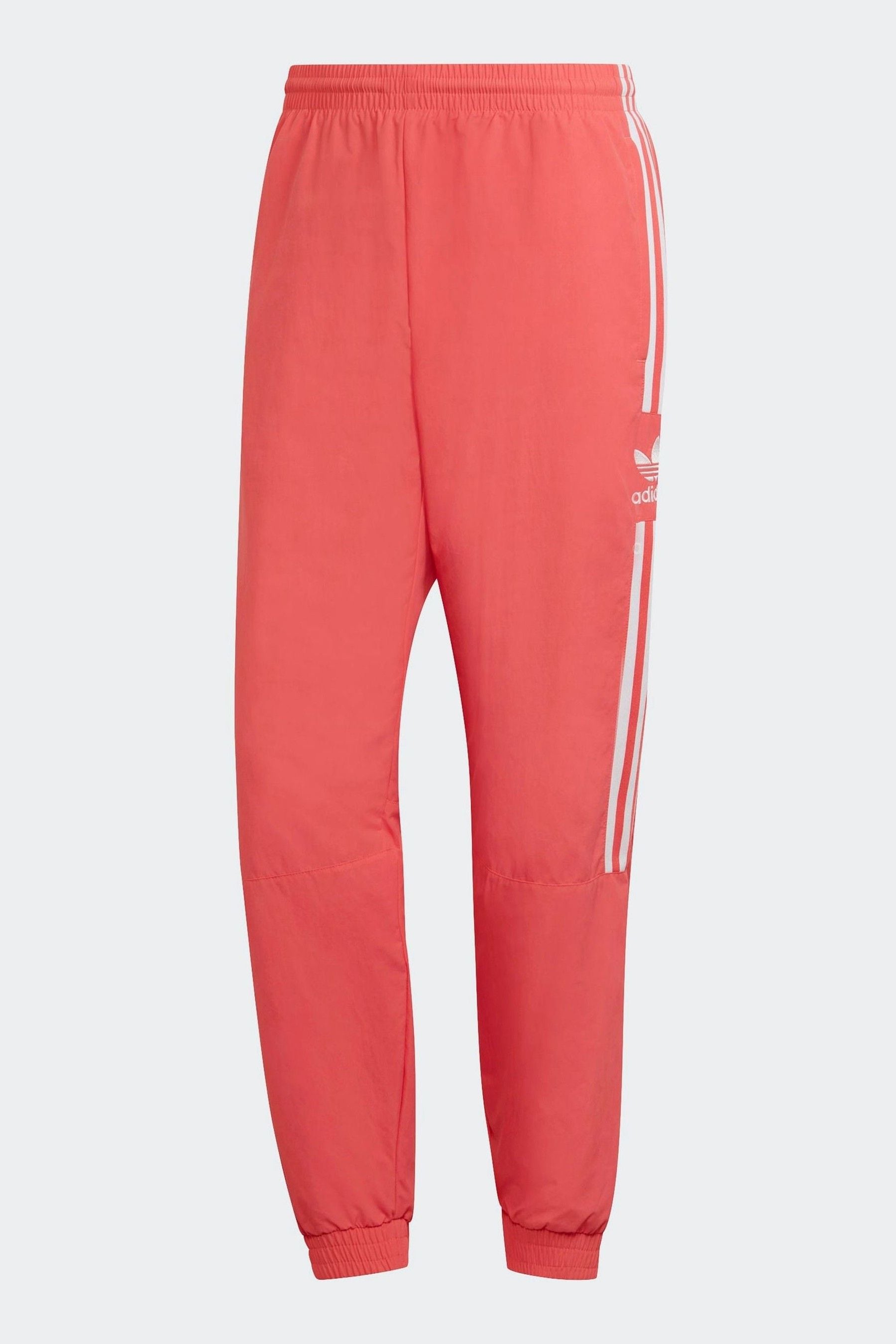 Adidas originals adicolor locked up logo track pants in online red