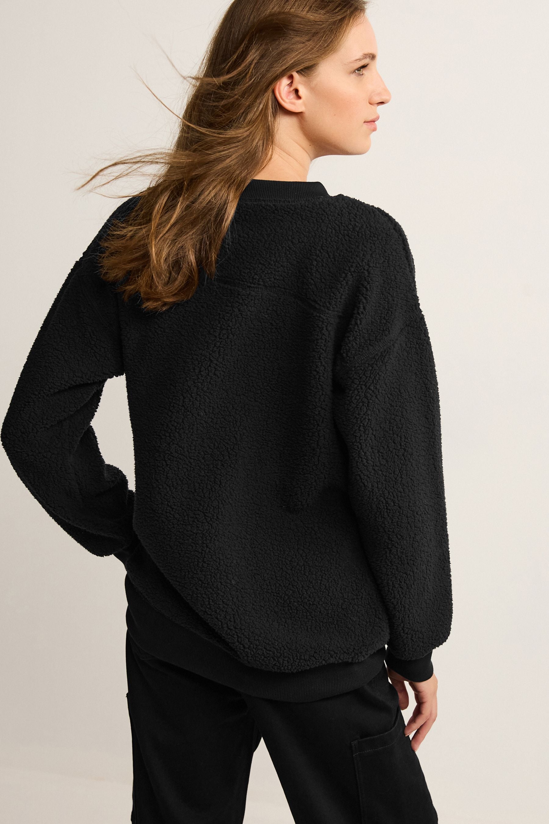 Buy Black Teddy Borg Longline Fleece Sweatshirt from the Next UK