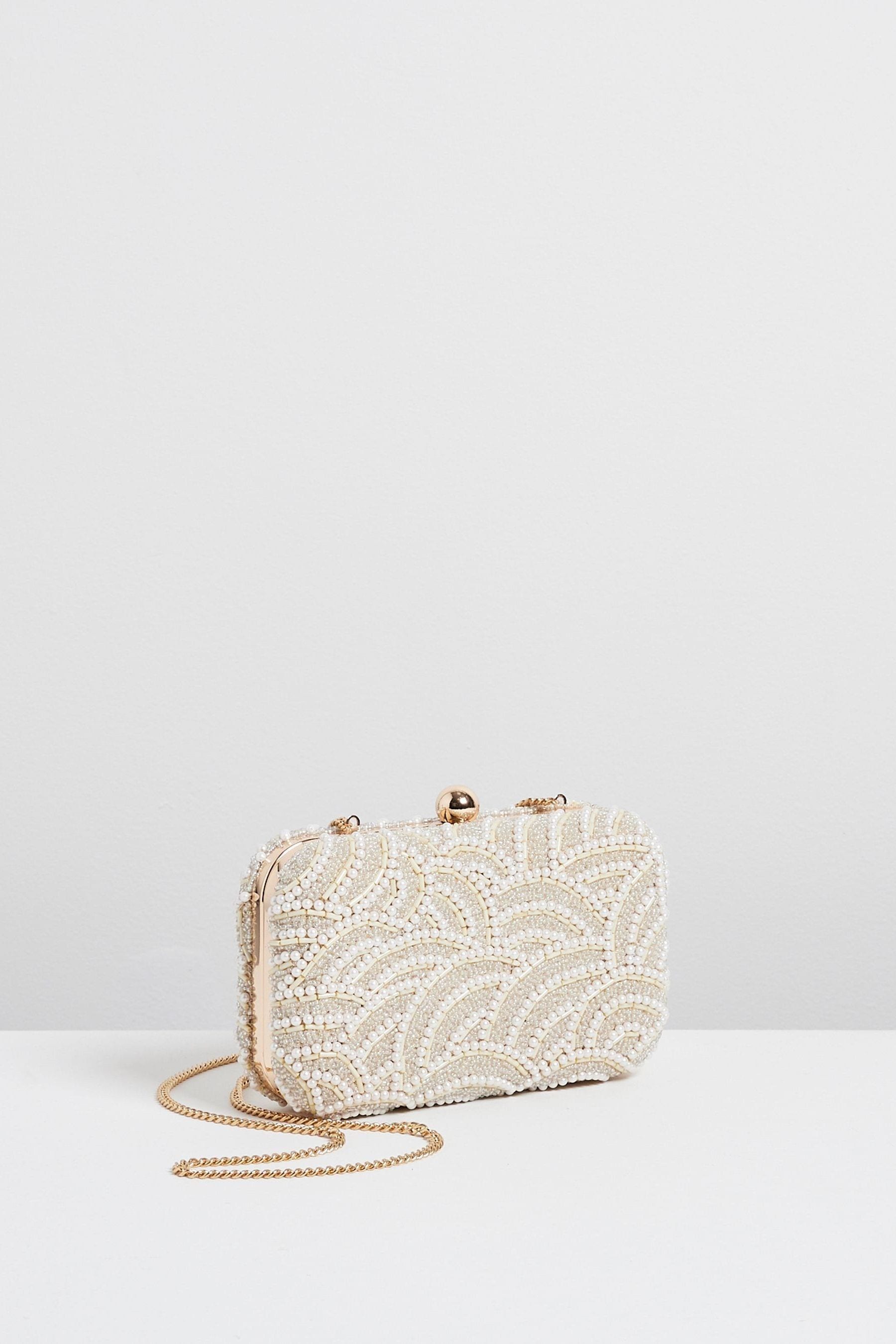 Ivory clutch 2025 bag next