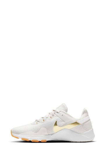 Nike White/Gold Legend Essential 2 Trainers