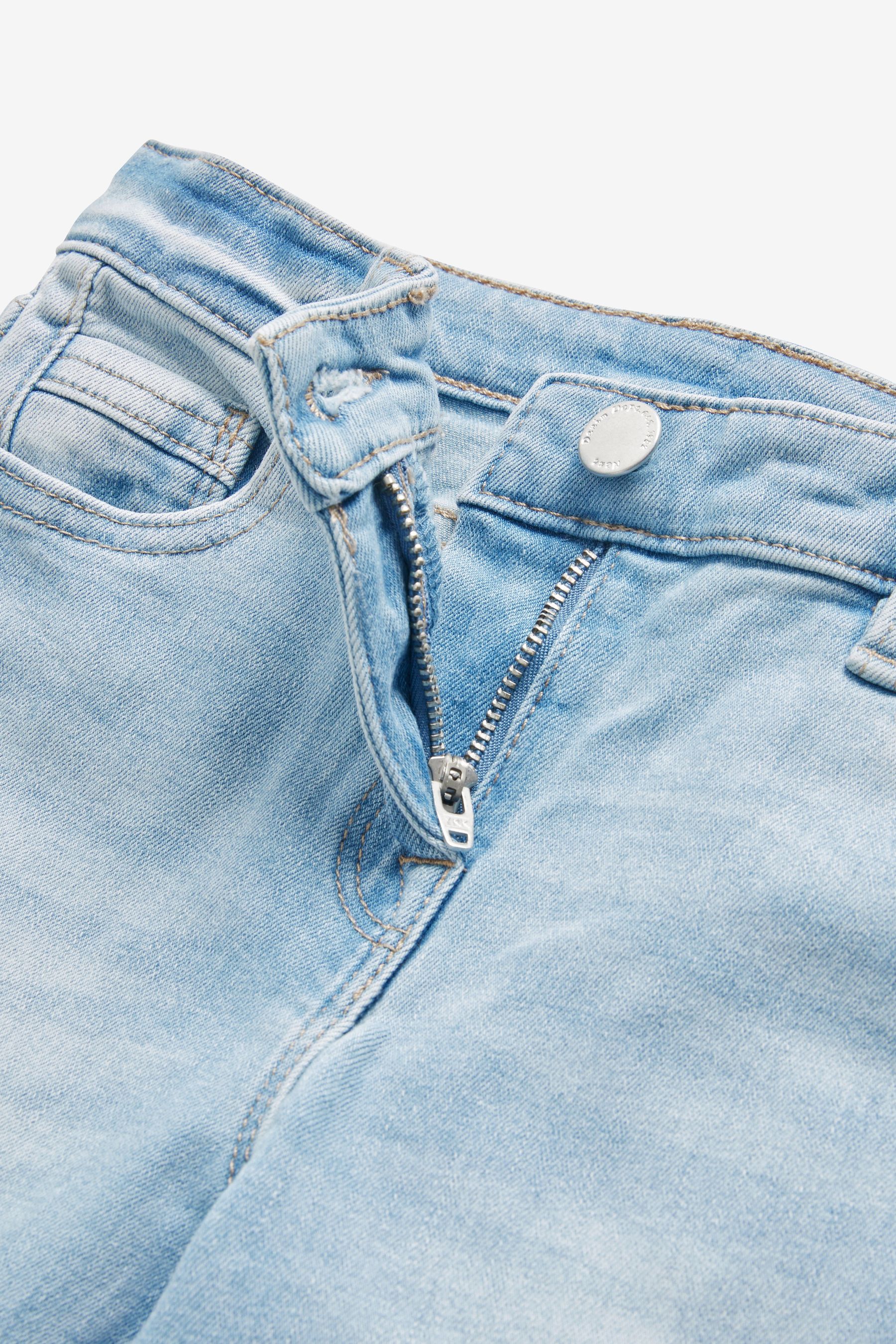 Light denim skinny jeans sales