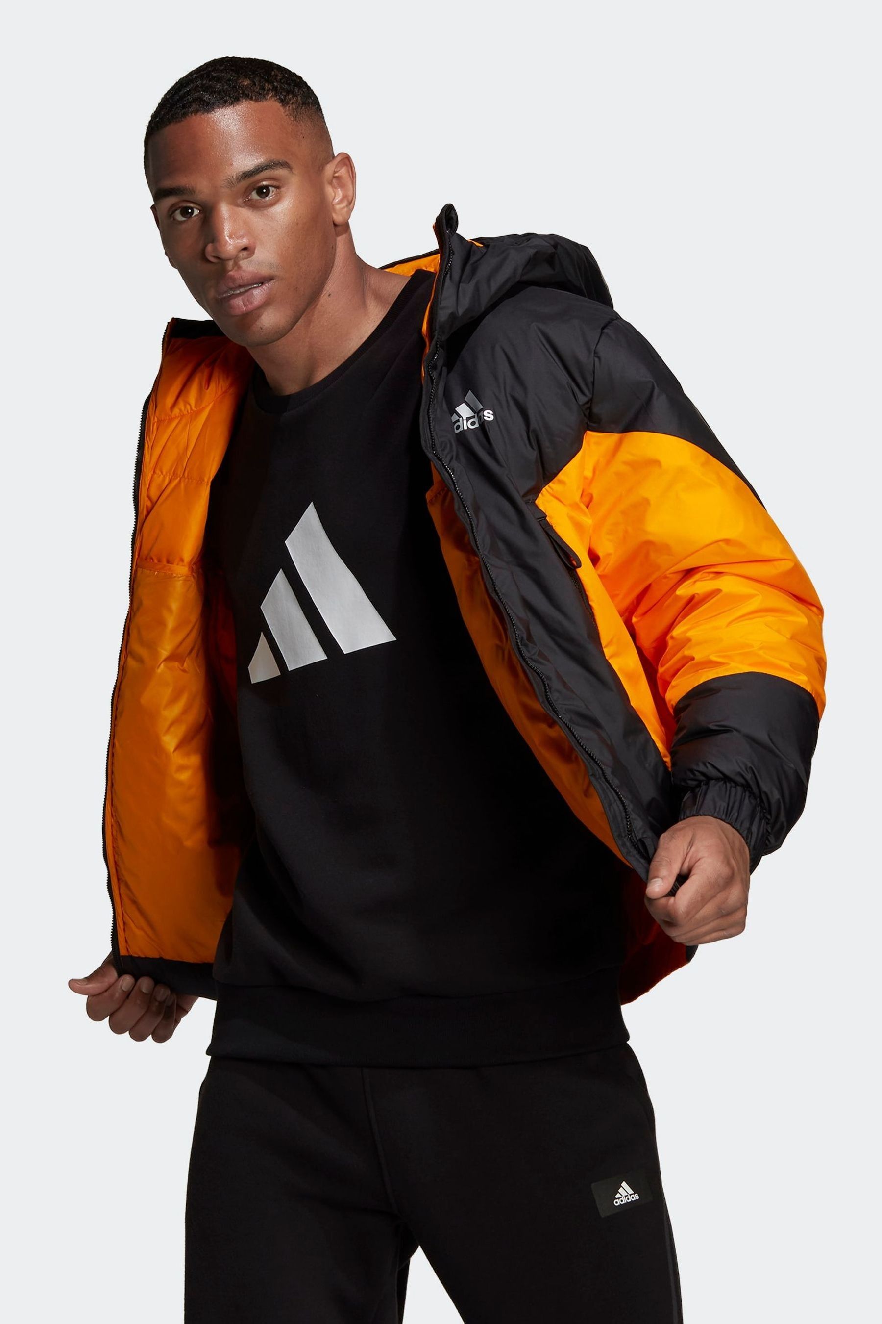 Adidas black shop and orange jacket