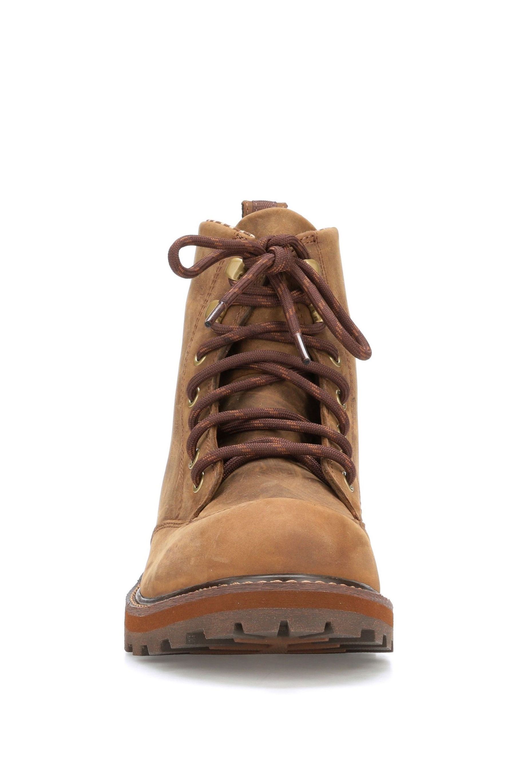 Muck outlet boot foreman