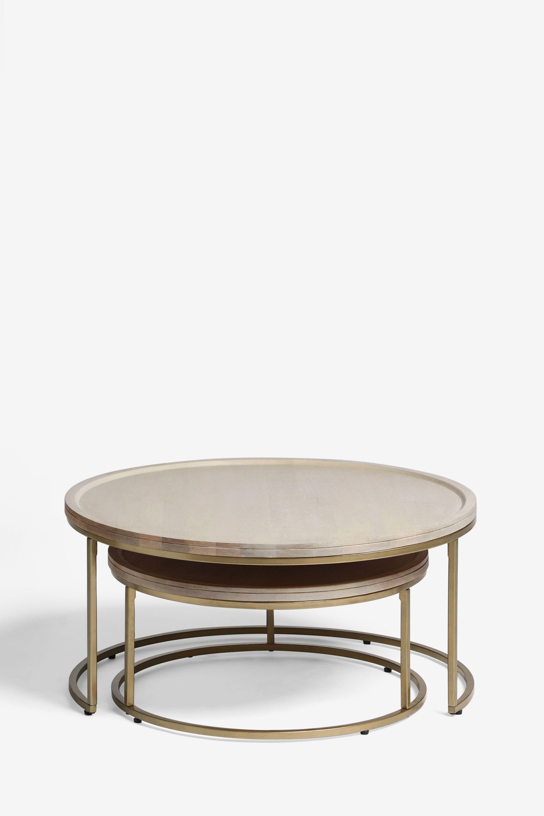 Light round top coffee table