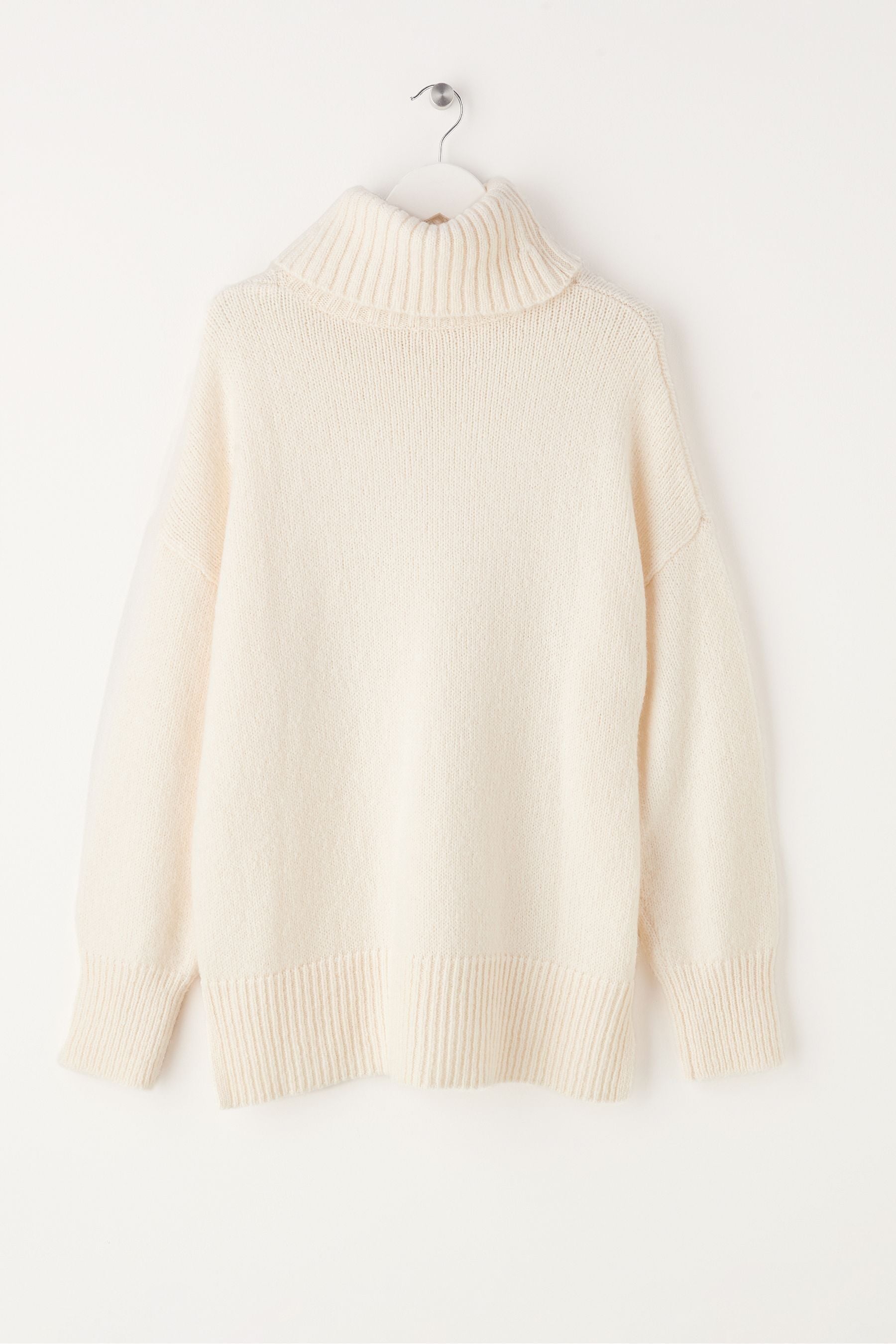 Oversize roll neck clearance jumper