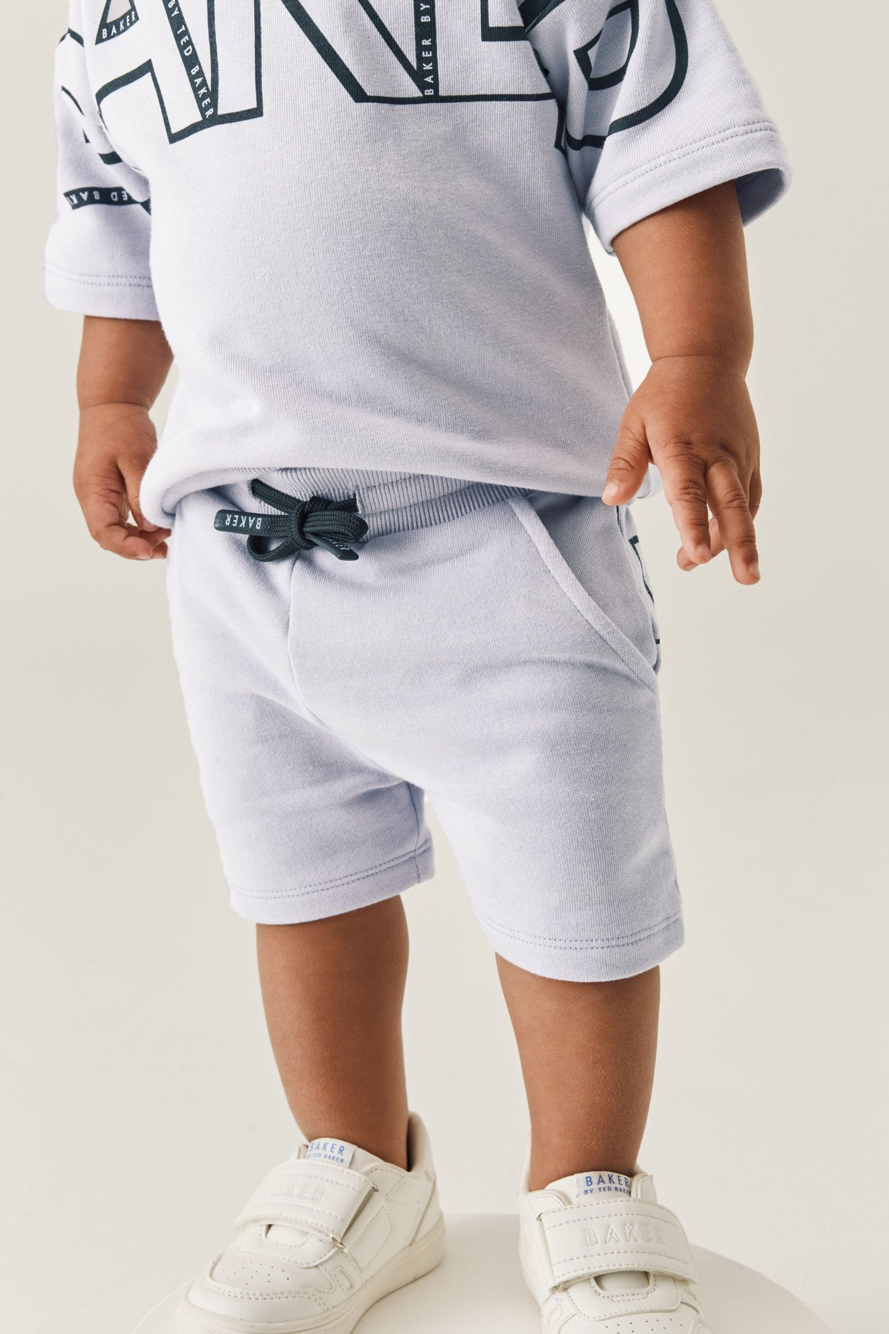 Shorts sweater clearance