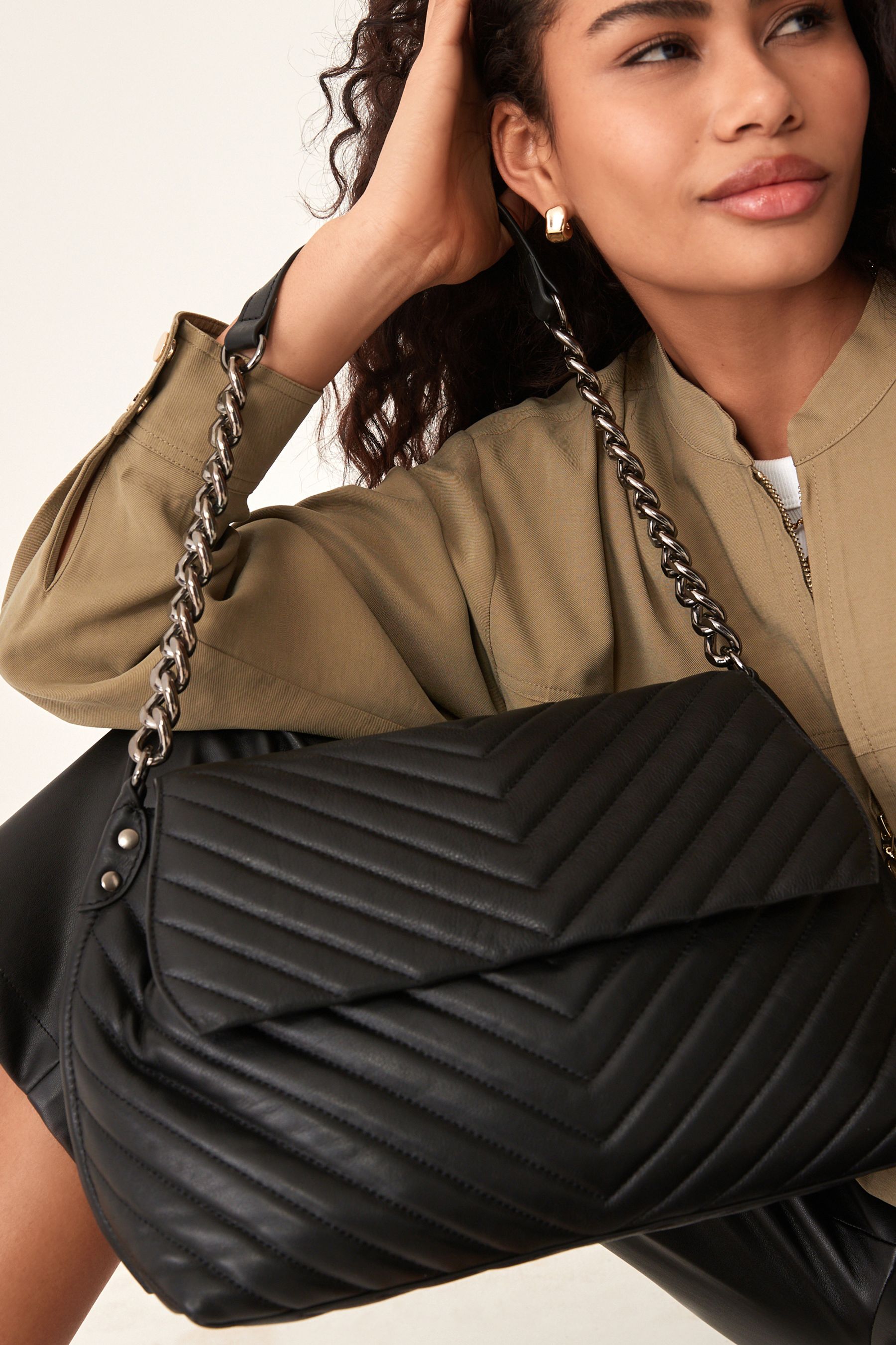 Buy Black Leather Quilted Chain Shoulder Bag from the Next UK online shop