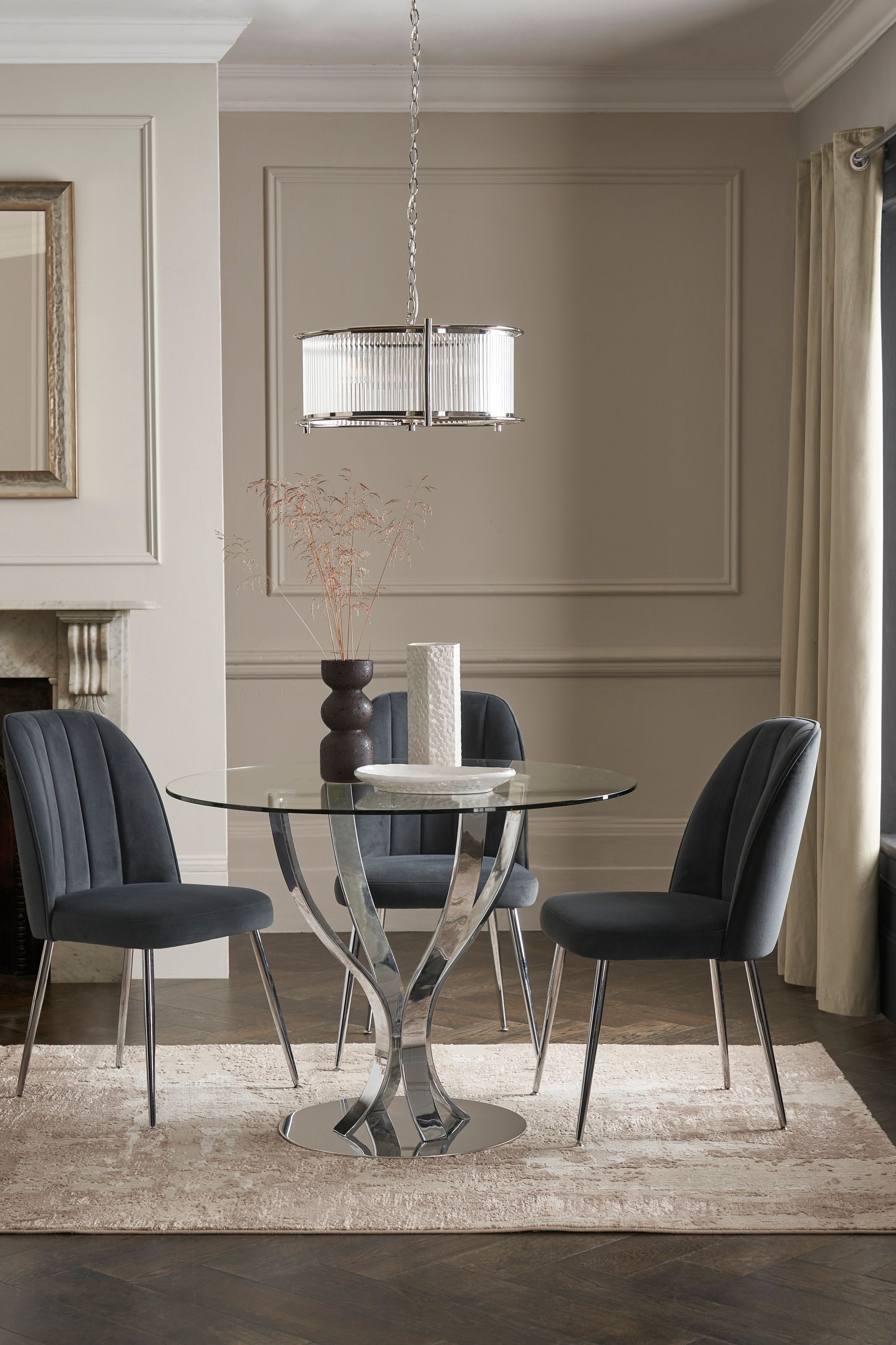 Glass and chrome store round dining table