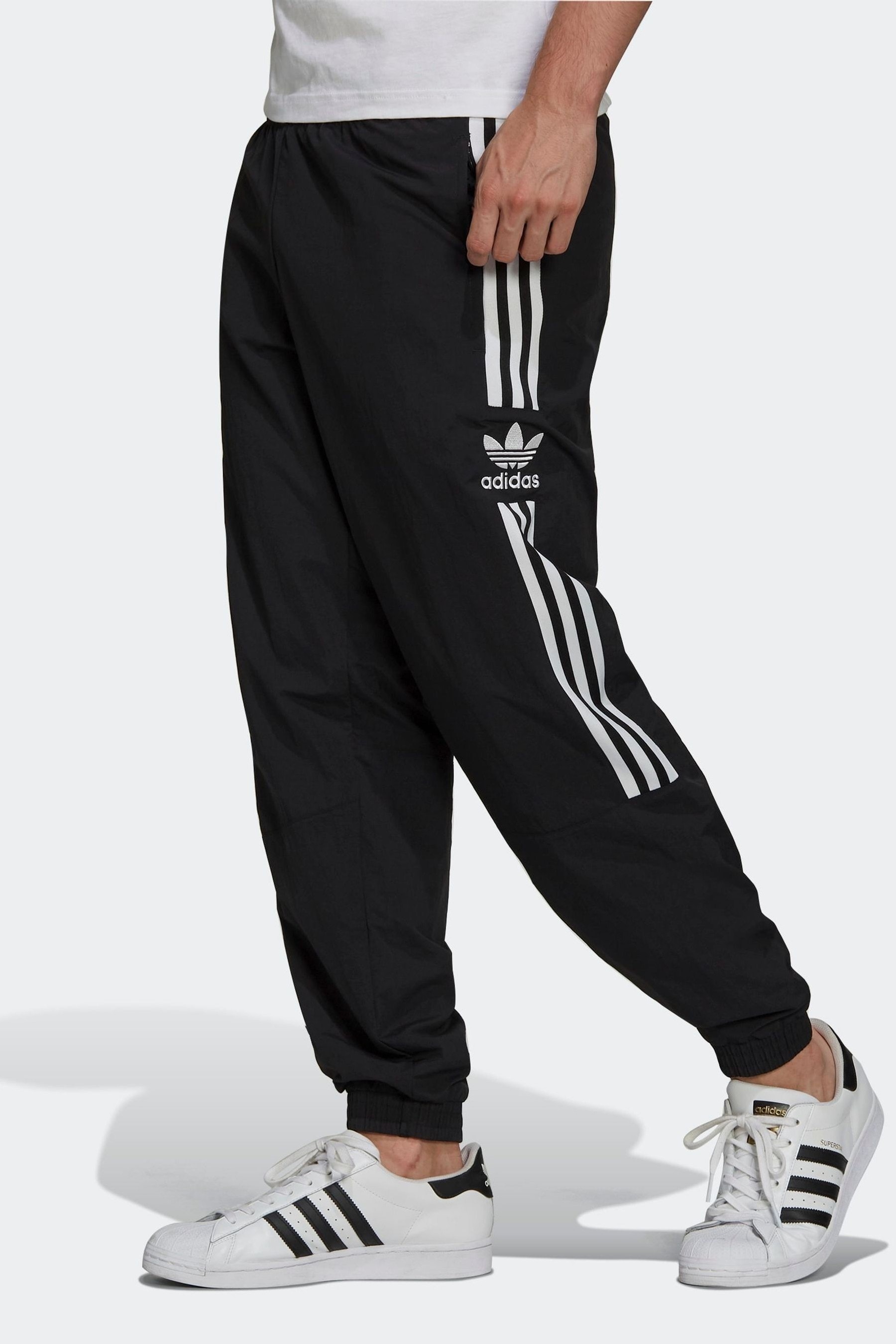 Adicolor locked up logo track pants clearance