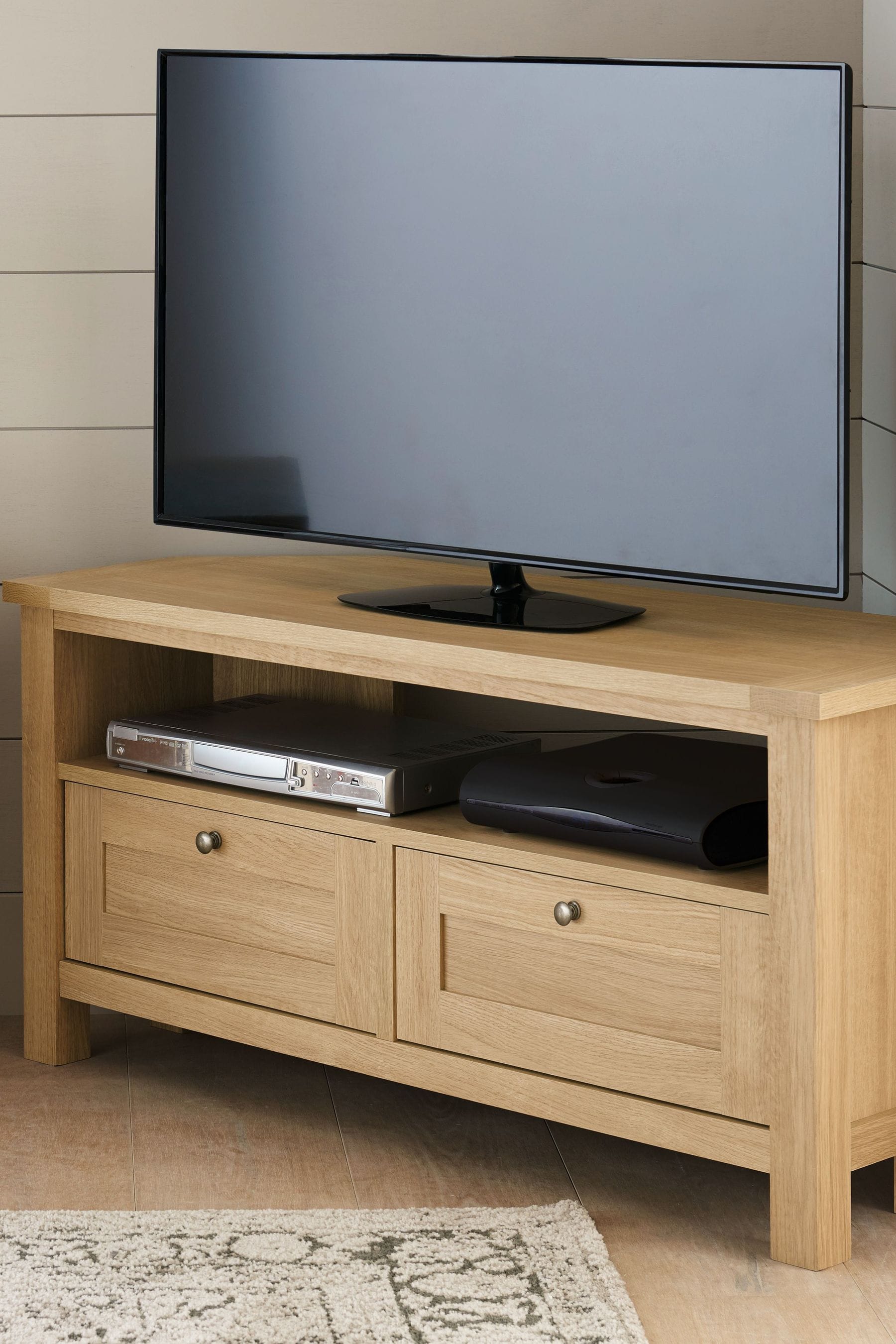 Oak effect shop corner tv unit