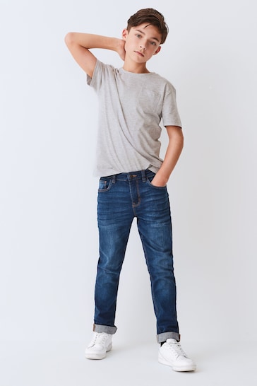 Buy Blue Regular Fit Cotton Rich Stretch Jeans (3-17yrs) from the Next ...