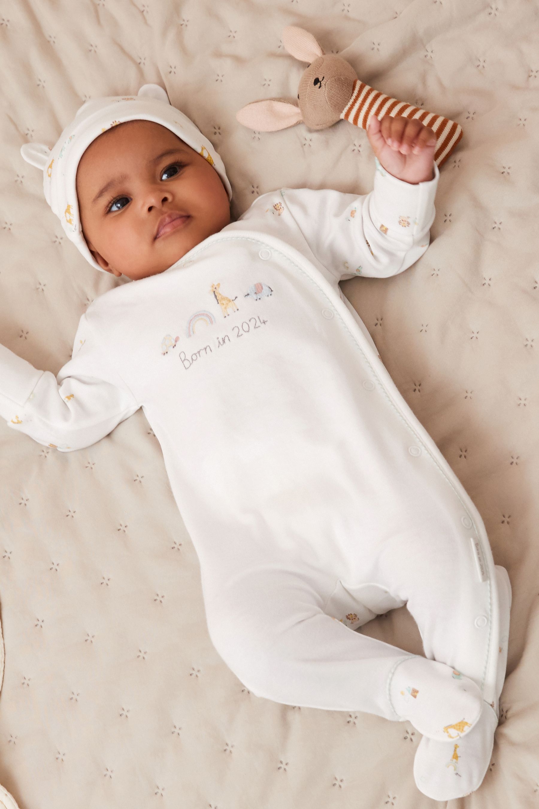 Buy White Born in 2024 Baby Sleepsuit and Hat 2pc Set (09mths) from