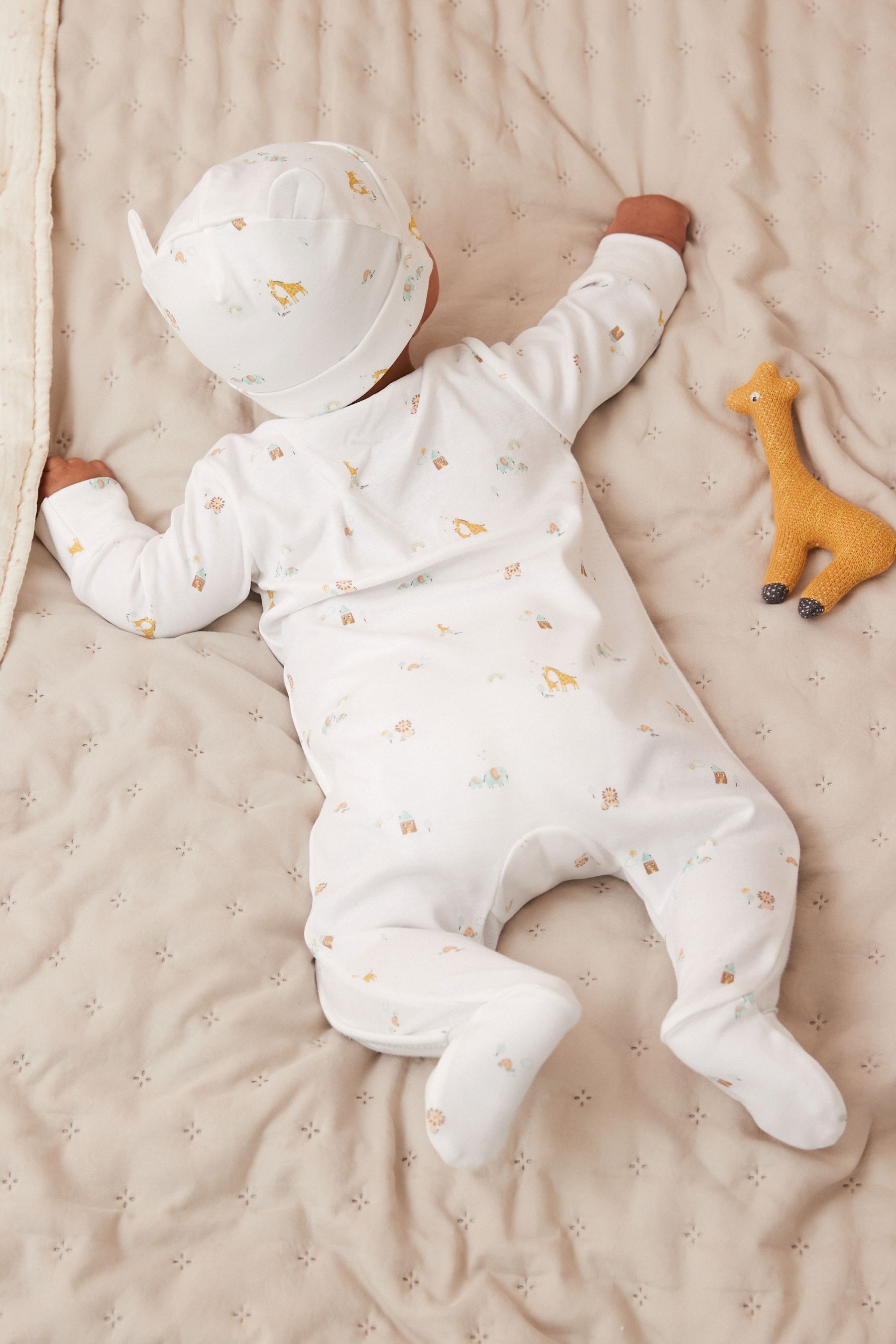 Buy White Born in 2024 Baby Sleepsuit and Hat 2pc Set (09mths) from
