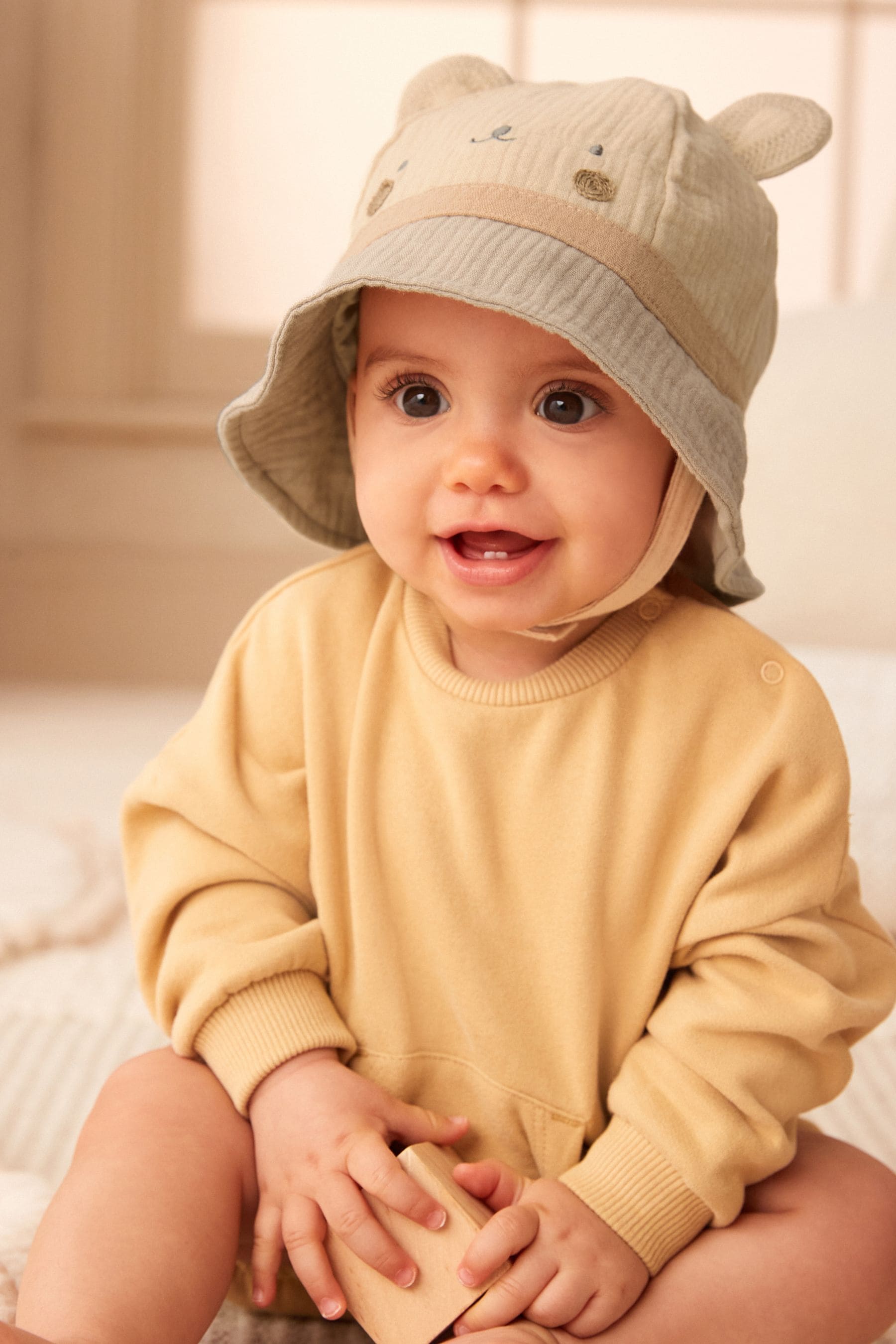 Baby with bucket on sale hat