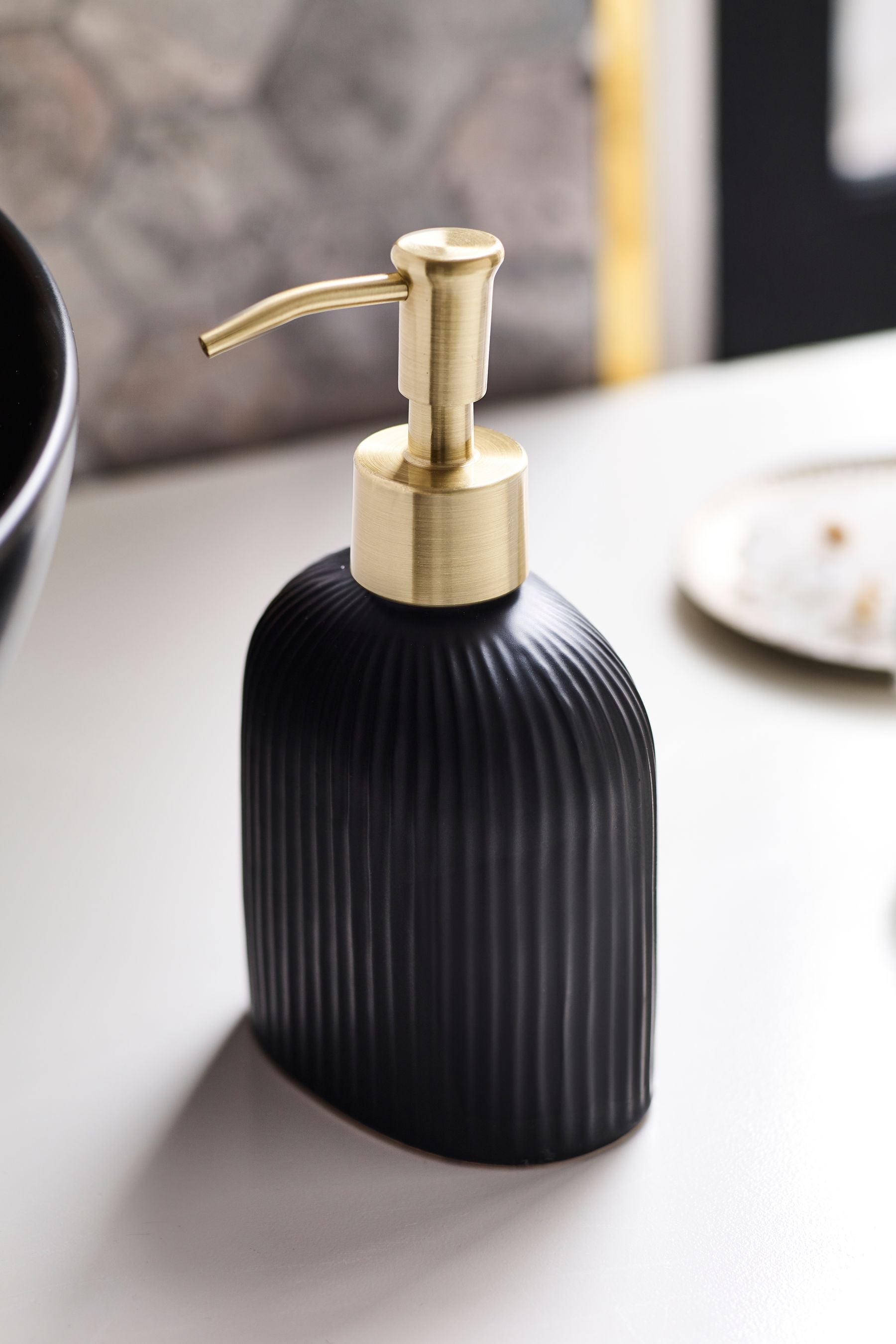 Black online soap dispenser