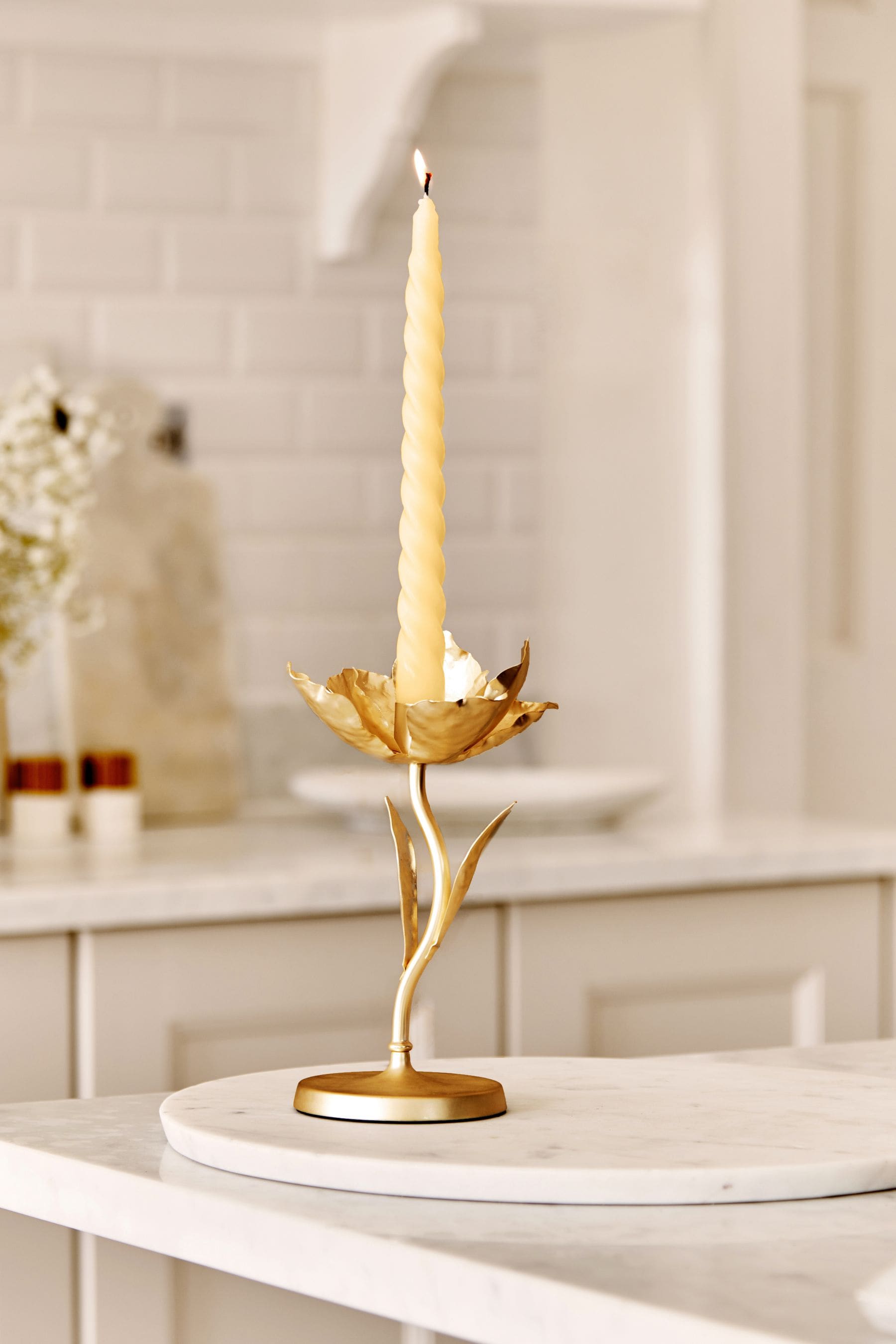 Gold taper candle holder deals