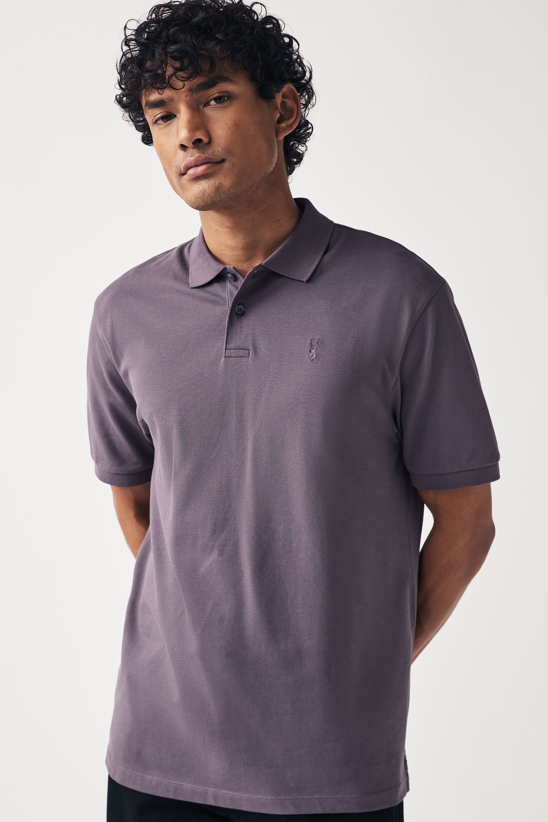Dark purple top polo shirts