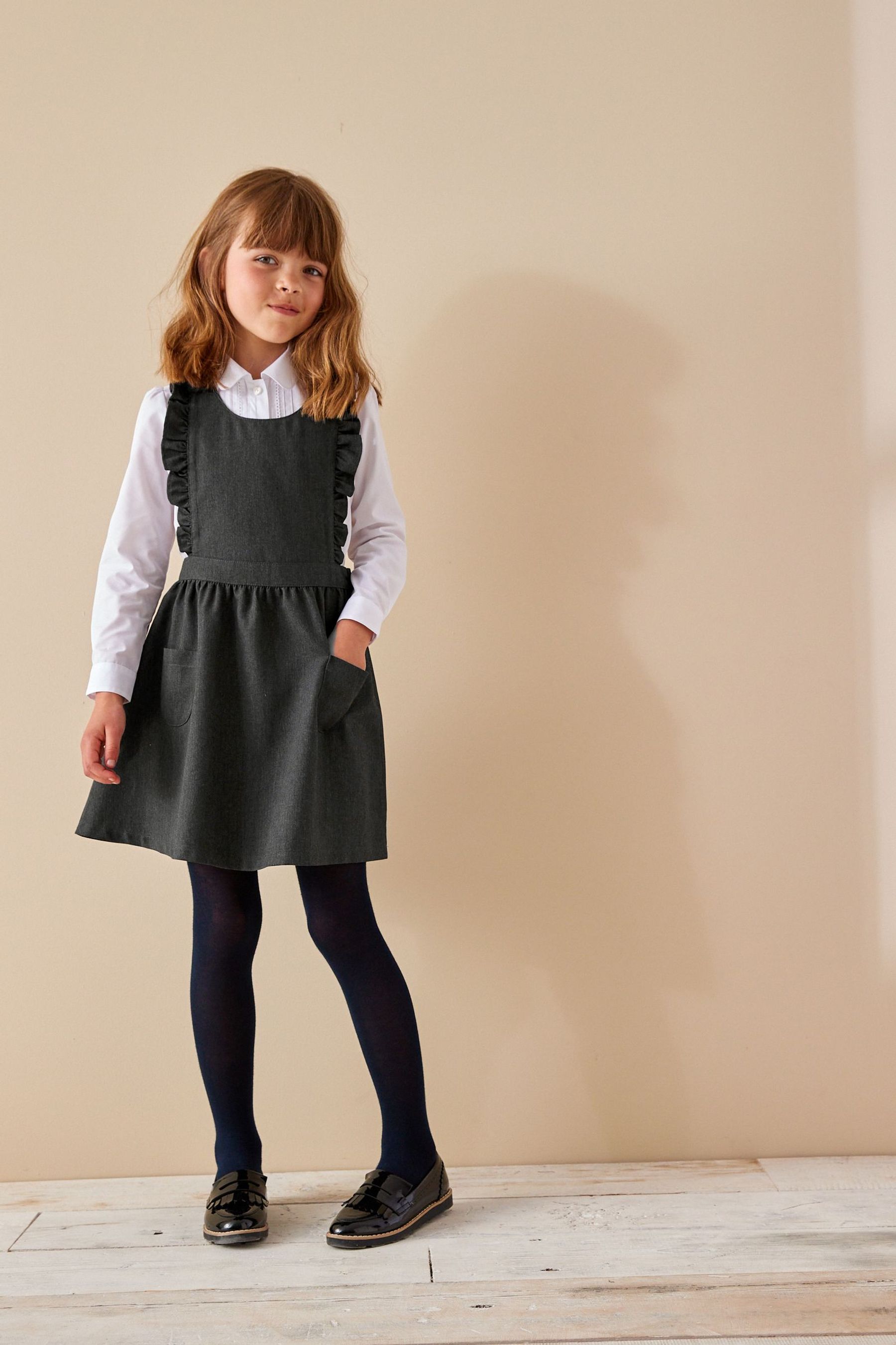 moncur ruffle neck pinafore