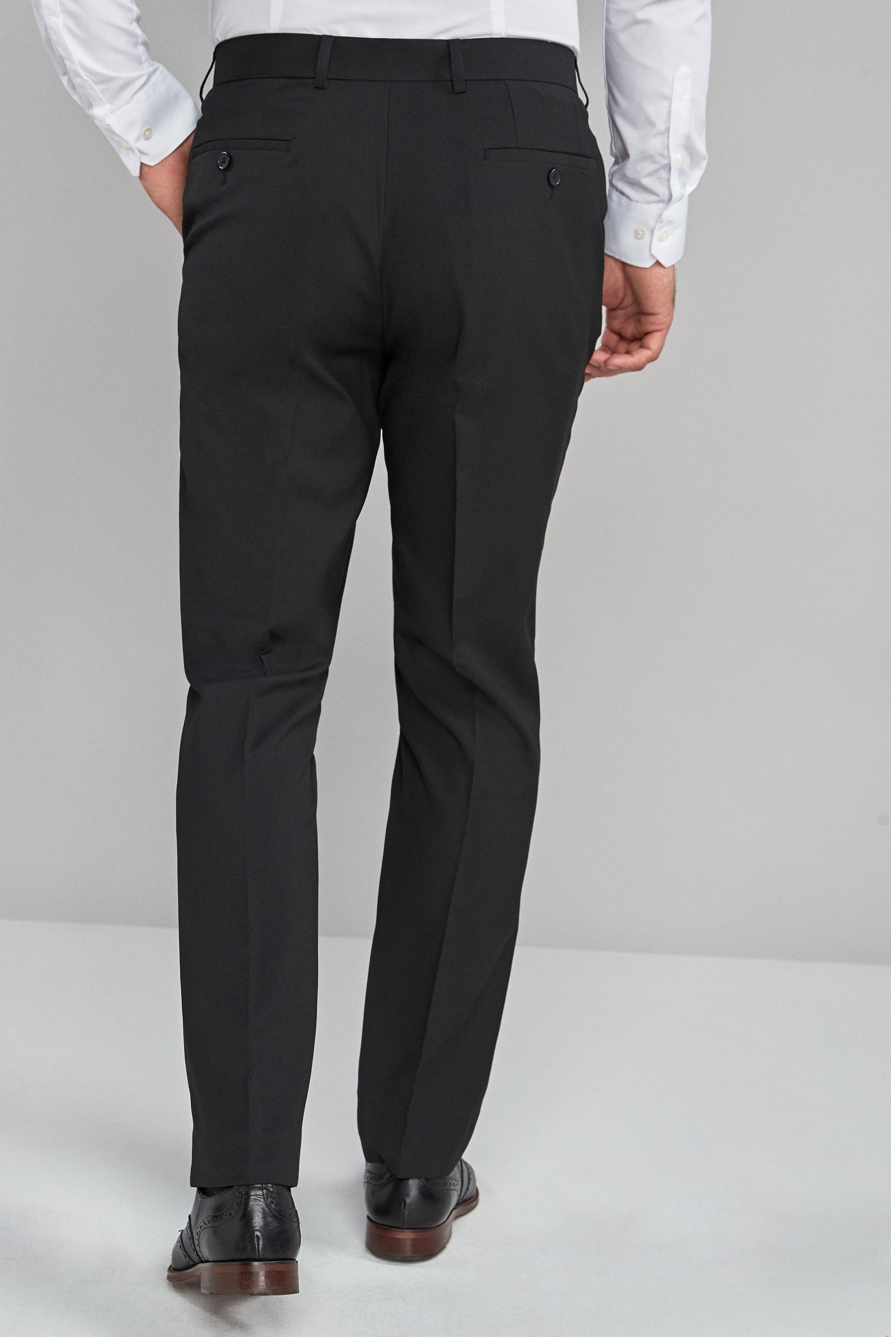 Buy Black Regular Fit Stretch Formal Trousers from the Next UK online shop